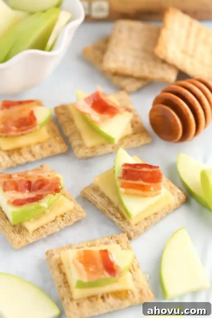 Honeyed Apple, Bacon & Smoked Gouda Bites 5 A beautifully arranged platter of Smoked Gouda, Apple, Bacon, and Honey Bites, ready to be served to guests.