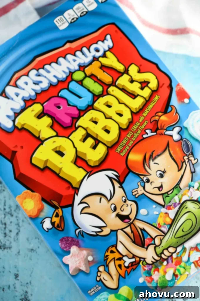A close-up of Marshmallow Fruity Pebbles cereal, showcasing its vibrant colors and tiny marshmallows.