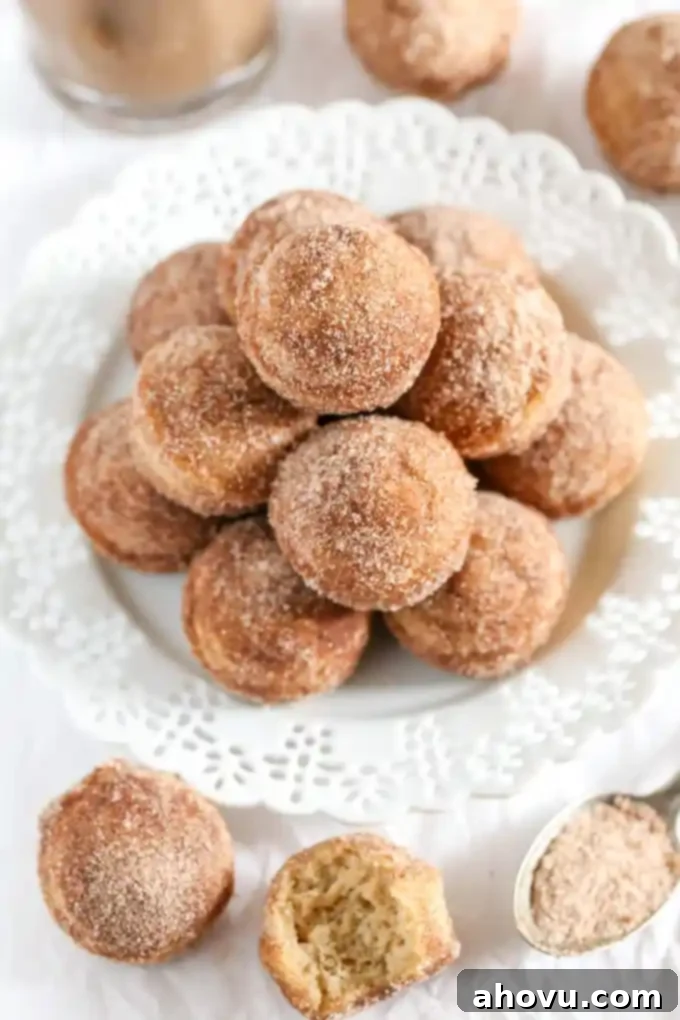 These Baked Cinnamon Sugar Donut Holes are easy to make and perfect for breakfast!