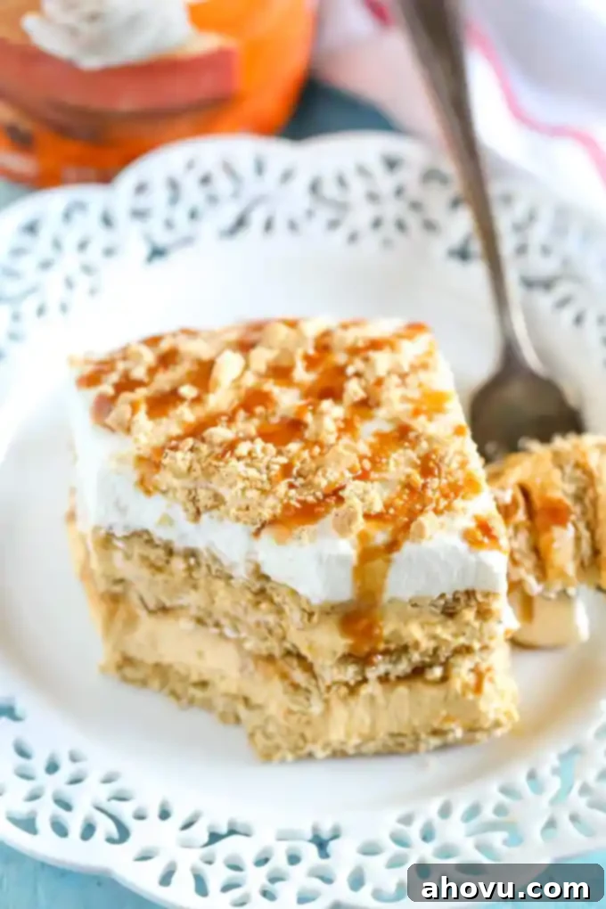 Layers of graham crackers, no-bake pumpkin spice cheesecake filling, and caramel topped off with homemade whipped cream. This No-Bake Pumpkin Caramel Icebox Cake is an easy and delicious fall dessert!