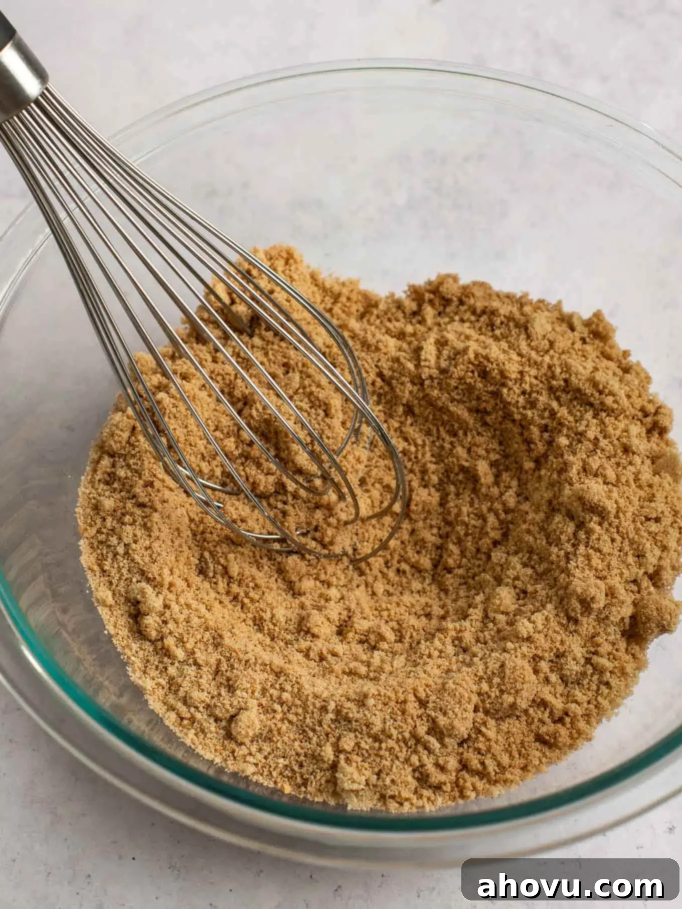 Spiced Pumpkin Perfection 11 A dry mixture of brown sugar, flour, and aromatic spices perfectly whisked together in a clean mixing bowl.