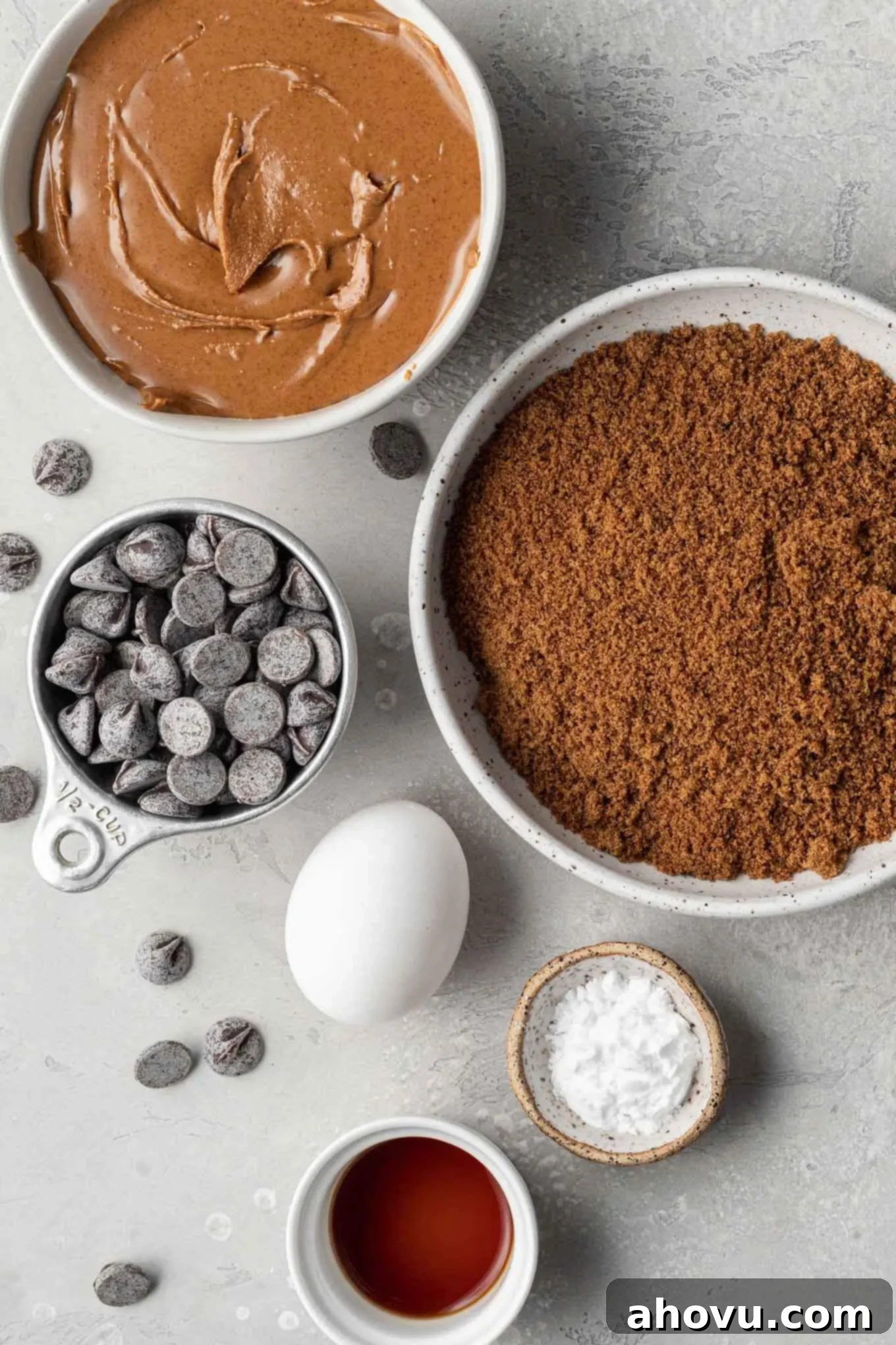 An overhead view of the ingredients needed to make almond butter chocolate chip cookies. 