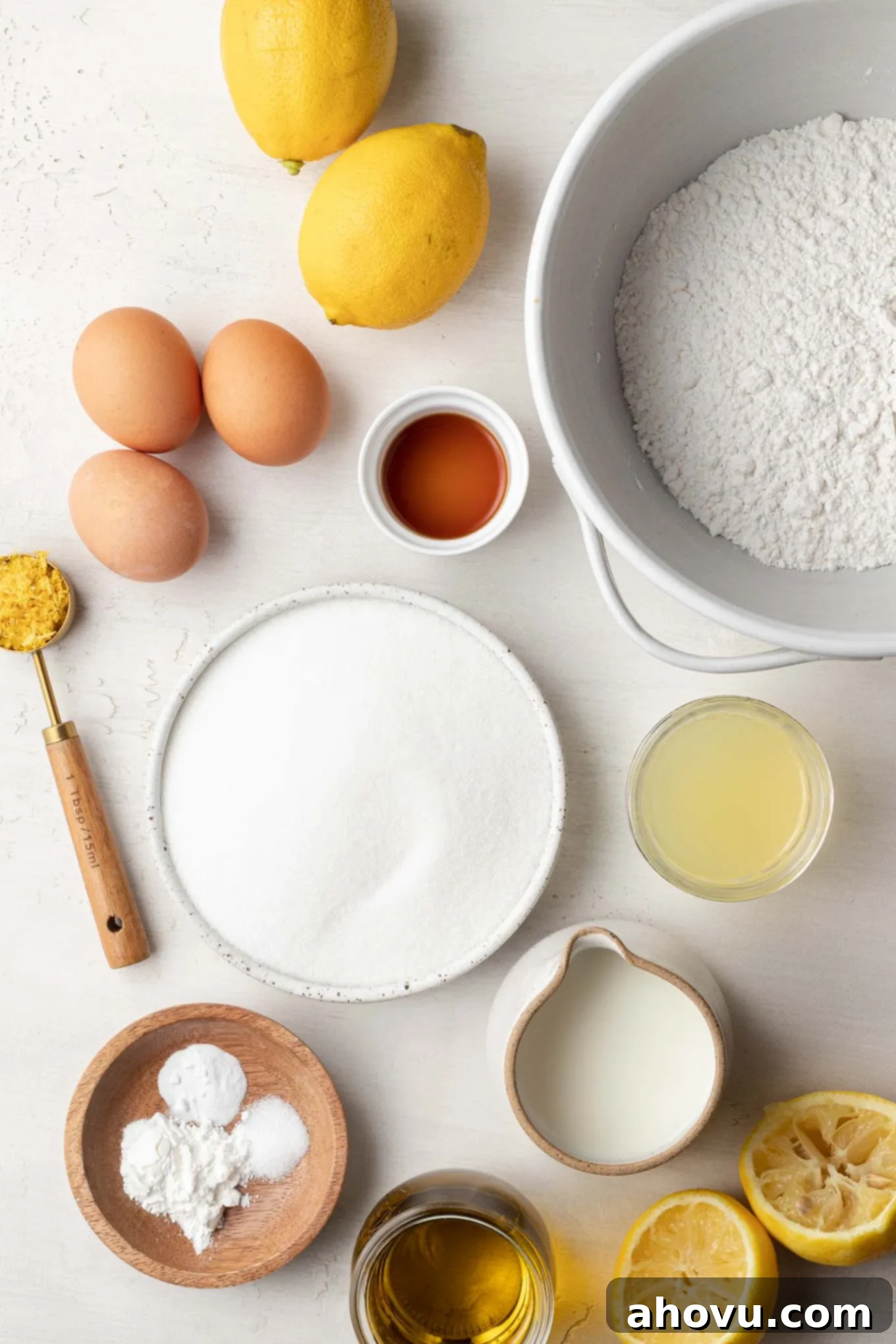 Sun-Kissed Lemon Olive Oil Cake 3 An overhead view of the ingredients needed to make an olive oil cake with lemon.