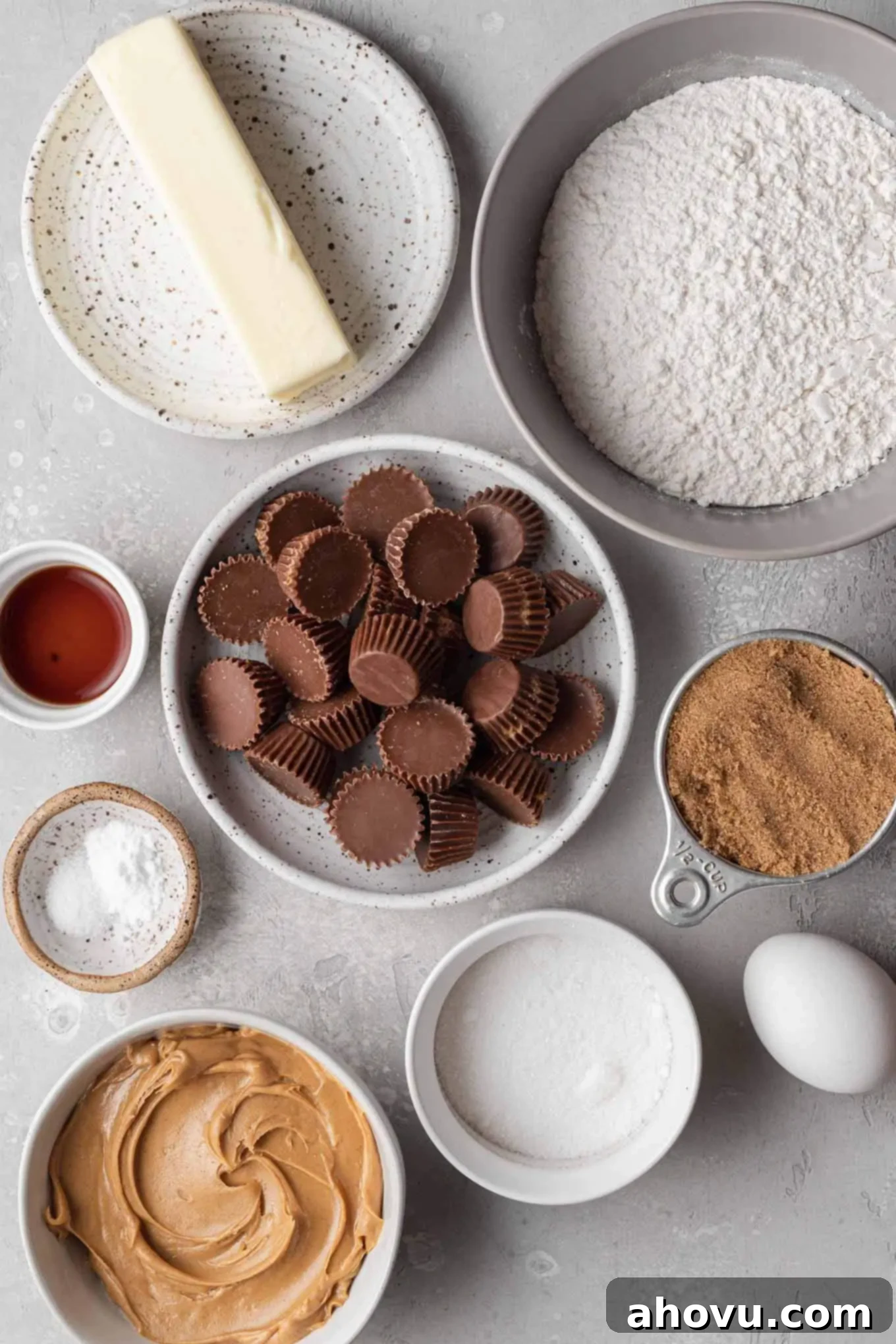 An overhead view of the ingredients needed to make peanut butter cookies with Reese's cups. 