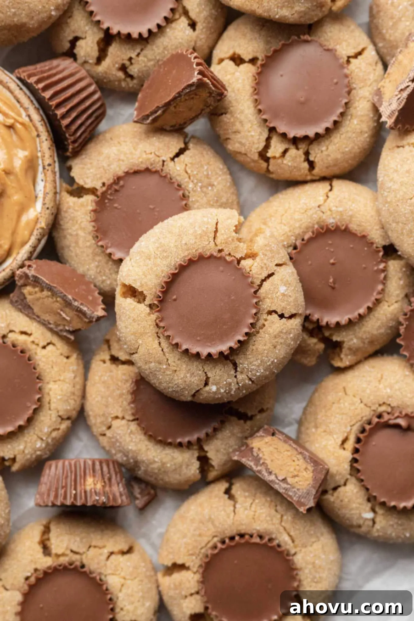 An overhead view of Reese's peanut butter cup cookies overlapping each other. 