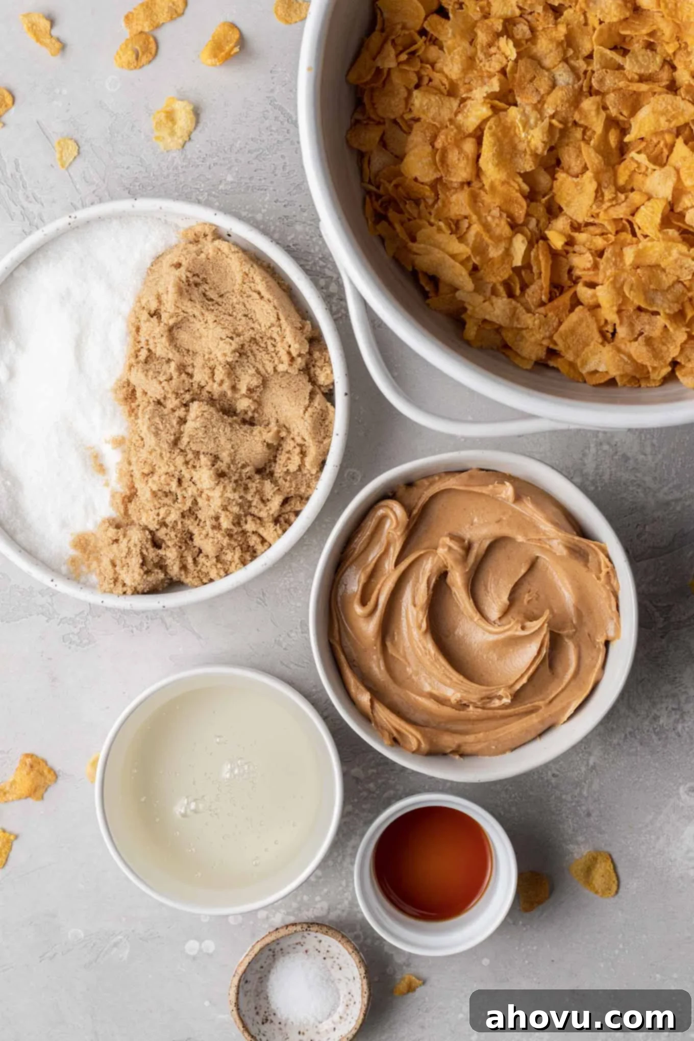 An overhead view of the essential ingredients laid out for making delicious peanut butter Cornflake cookies.