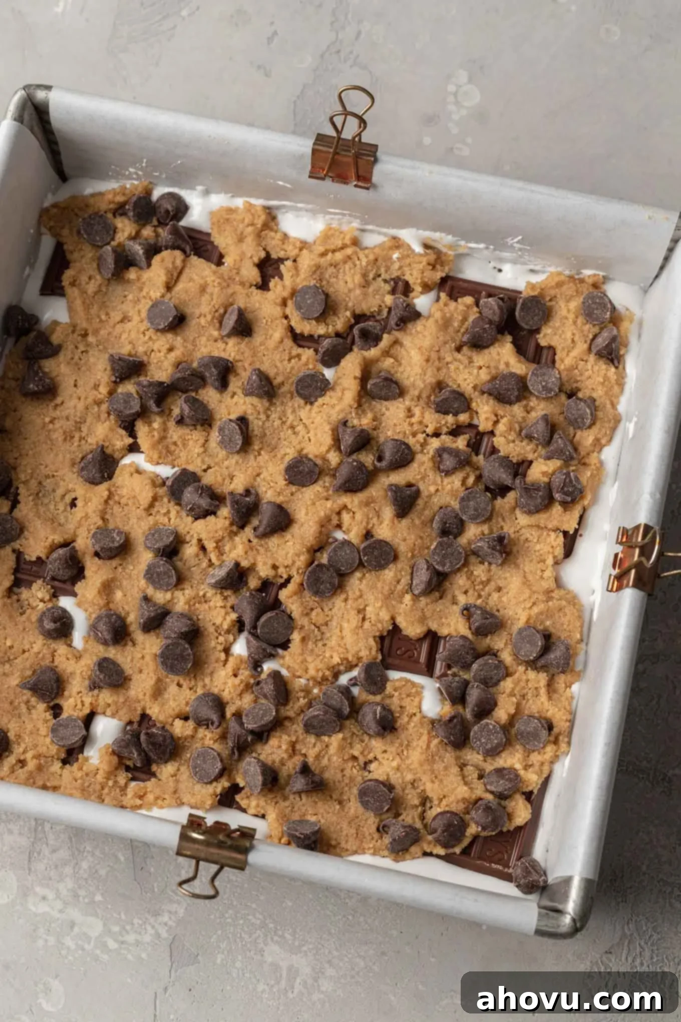 S'mores Bars 7 S'mores bars layered in a pan and ready to bake baked.