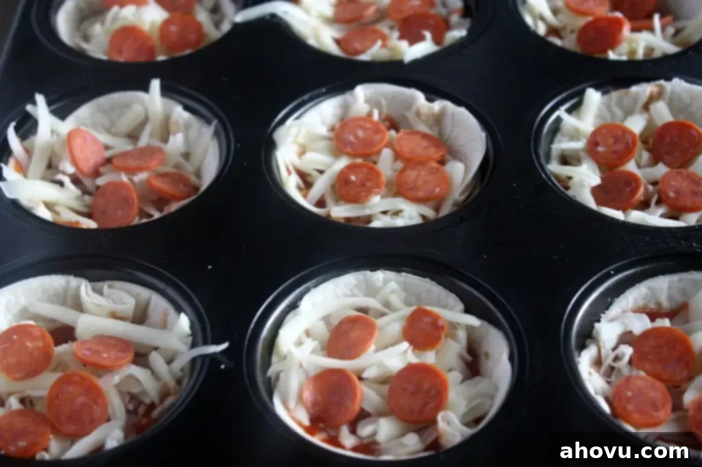 Assembling Mini Tortilla Pizzas in a muffin tin