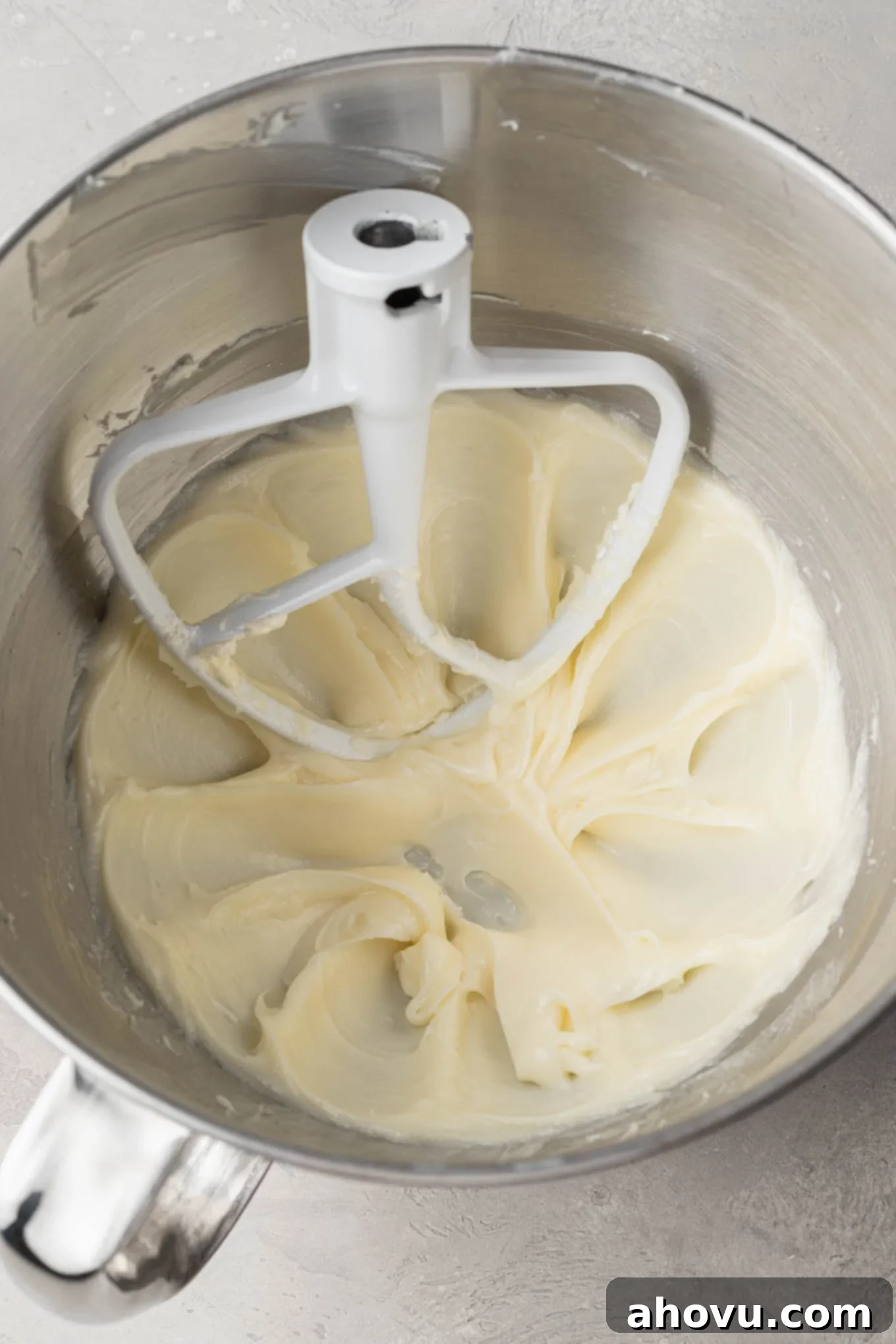 Creamy Dream Mints 5 An overhead view of the cream cheese mint mixture after initial mixing, showing a smooth, cohesive dough ready for shaping.