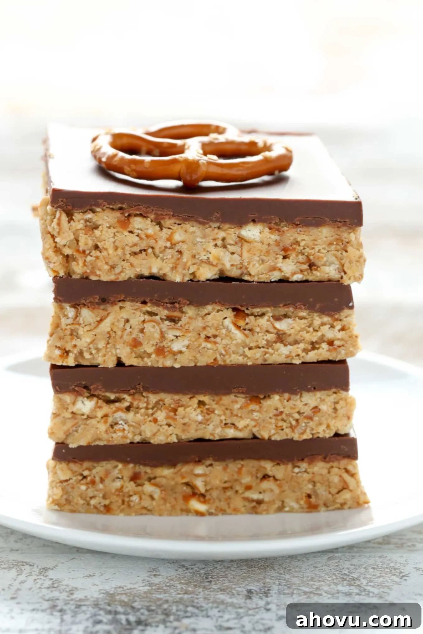 These No-Bake Peanut Butter Pretzel bars are the perfect sweet and salty dessert. You only need five ingredients to make these incredibly easy bars too!
