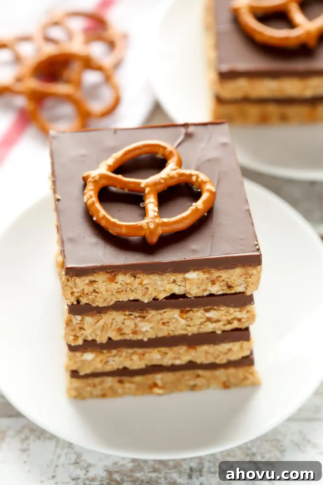 These No-Bake Peanut Butter Pretzel bars are the perfect sweet and salty dessert. You only need five ingredients to make these incredibly easy bars too!