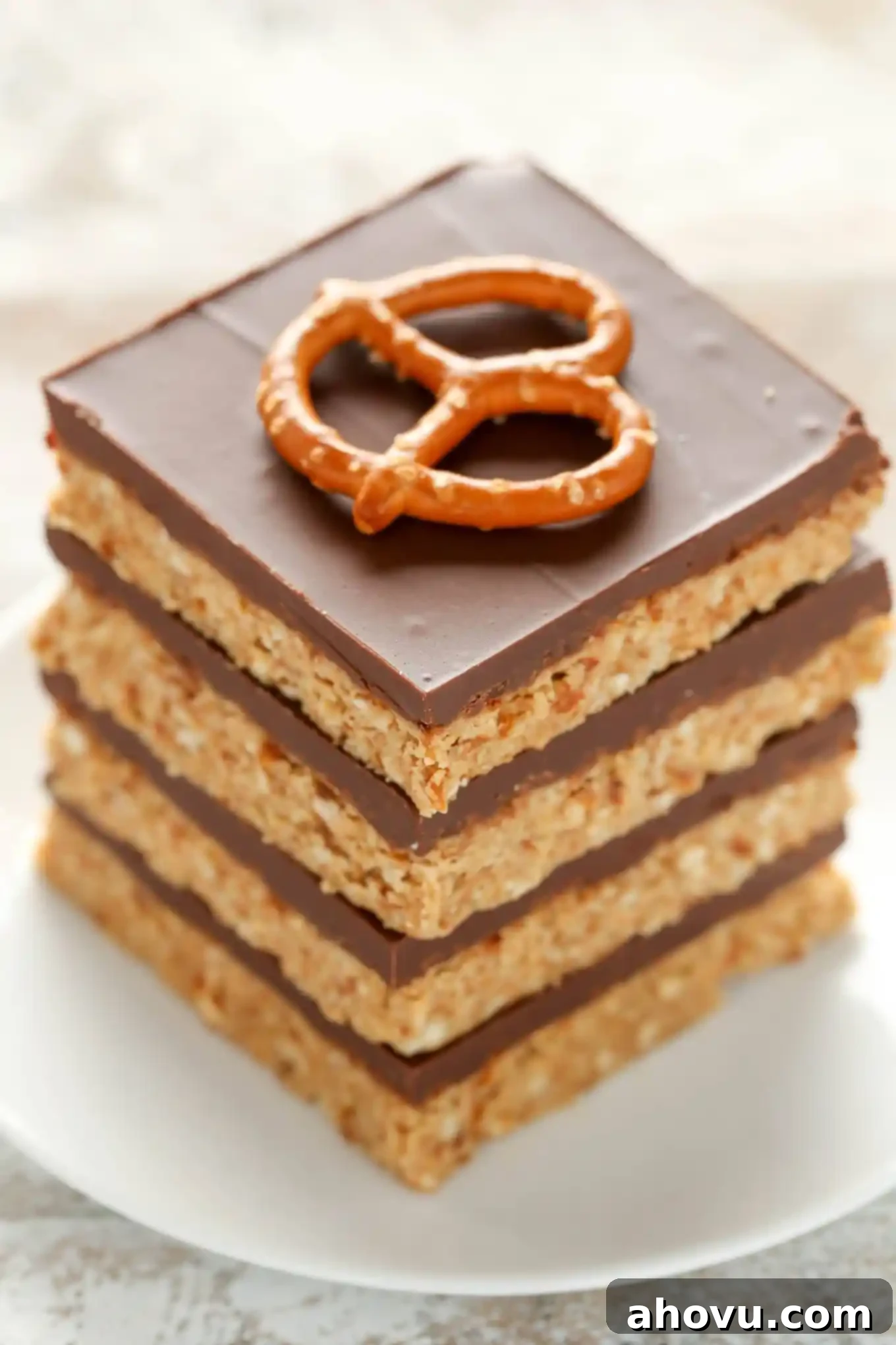 These No-Bake Peanut Butter Pretzel bars are the perfect sweet and salty dessert. You only need five ingredients to make these incredibly easy bars too!