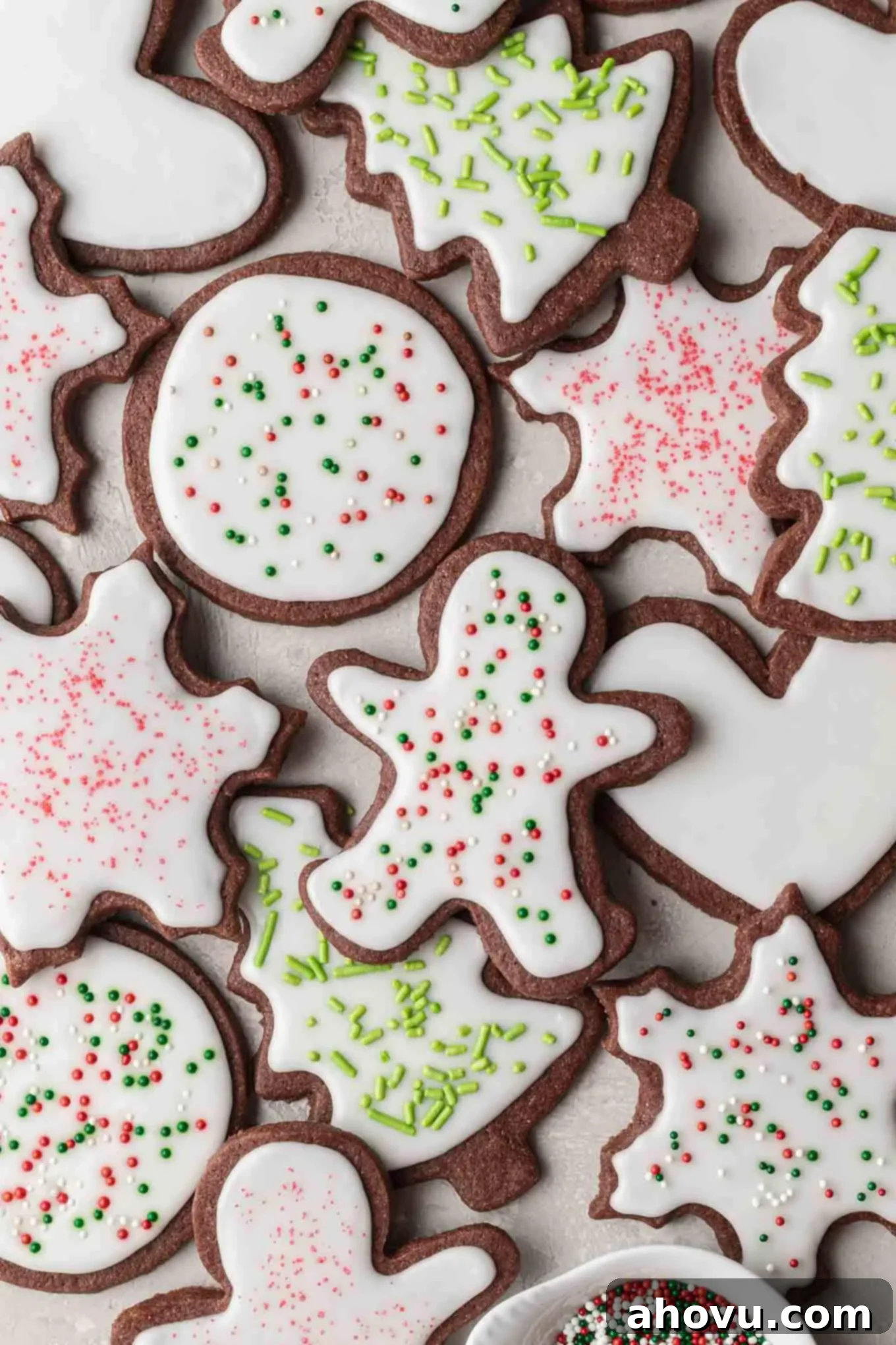 An overhead view of beautifully iced chocolate sugar cookies, ready to be enjoyed or displayed.