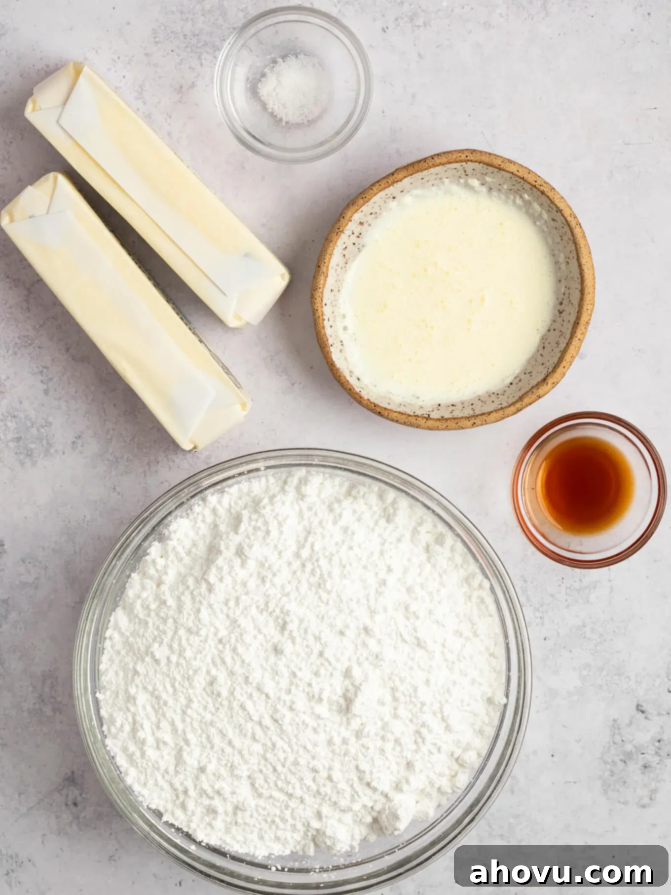 An overhead view of the simple yet essential ingredients needed for creating brown butter frosting, laid out neatly.