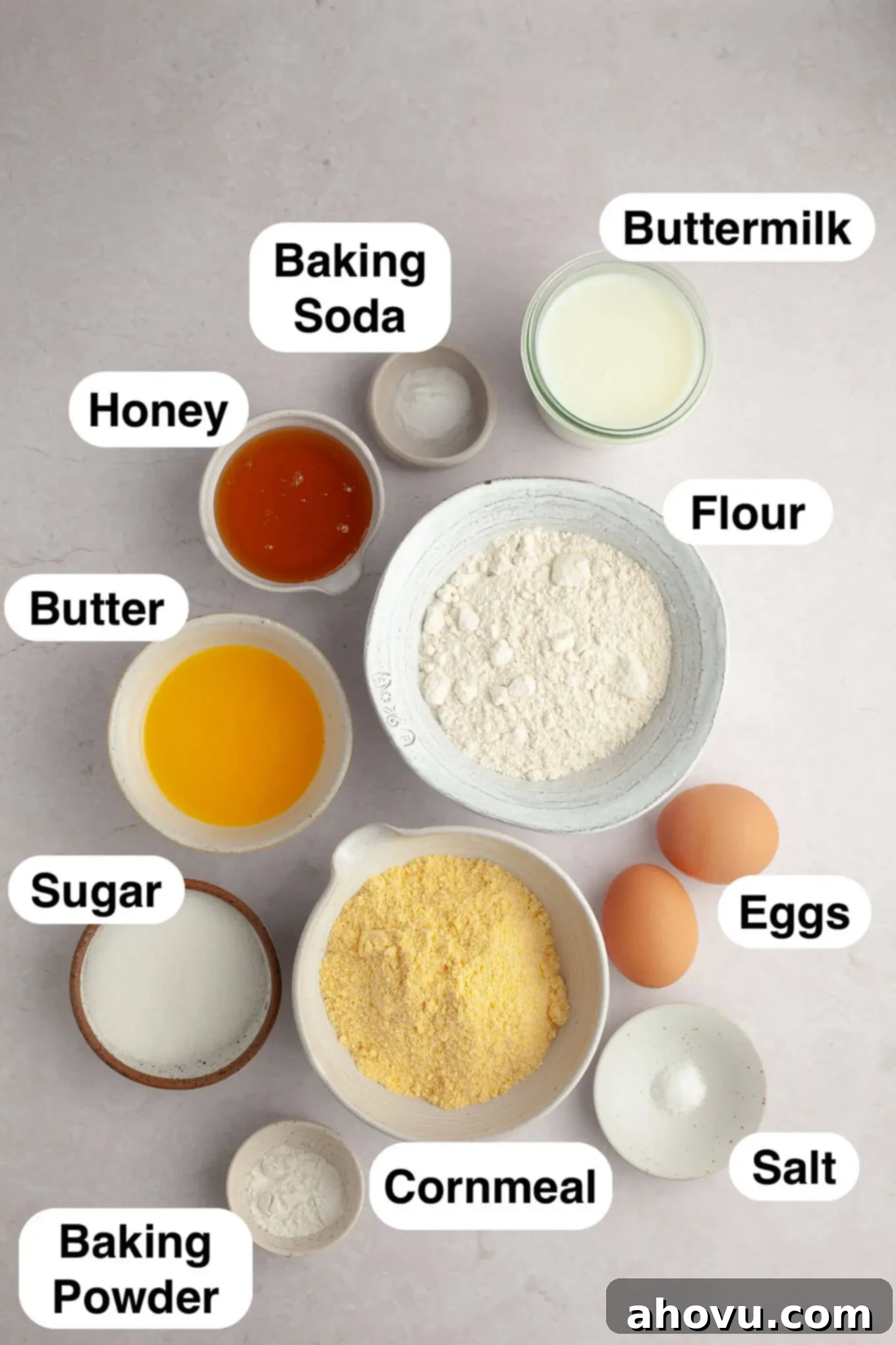 An overhead view of the ingredients needed to make cornbread muffins. 