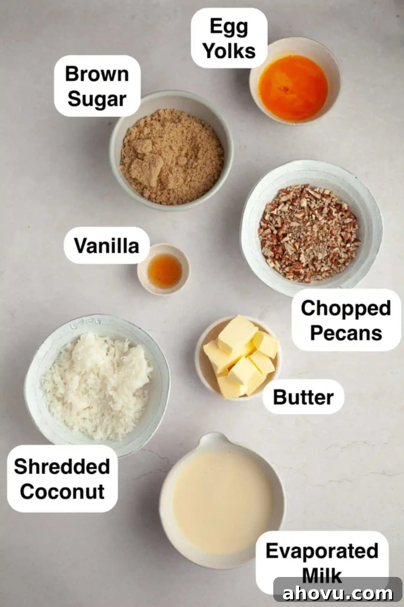 Decadent German Chocolate Cupcakes 4 A close-up, overhead view of the key ingredients for the creamy German chocolate frosting, including evaporated milk, egg yolks, butter, and brown sugar.