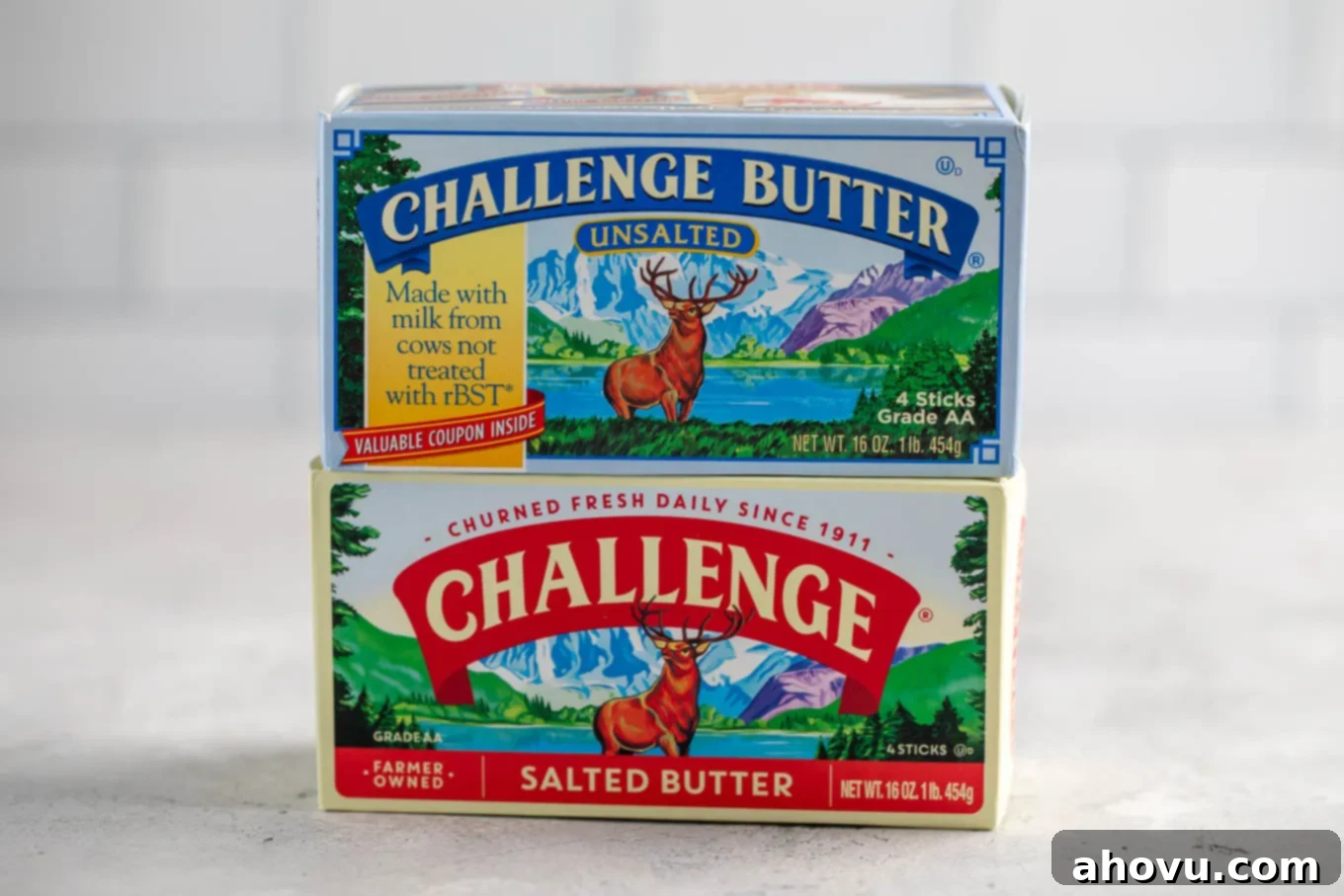 A box of unsalted butter sitting on top of a box of salted butter.