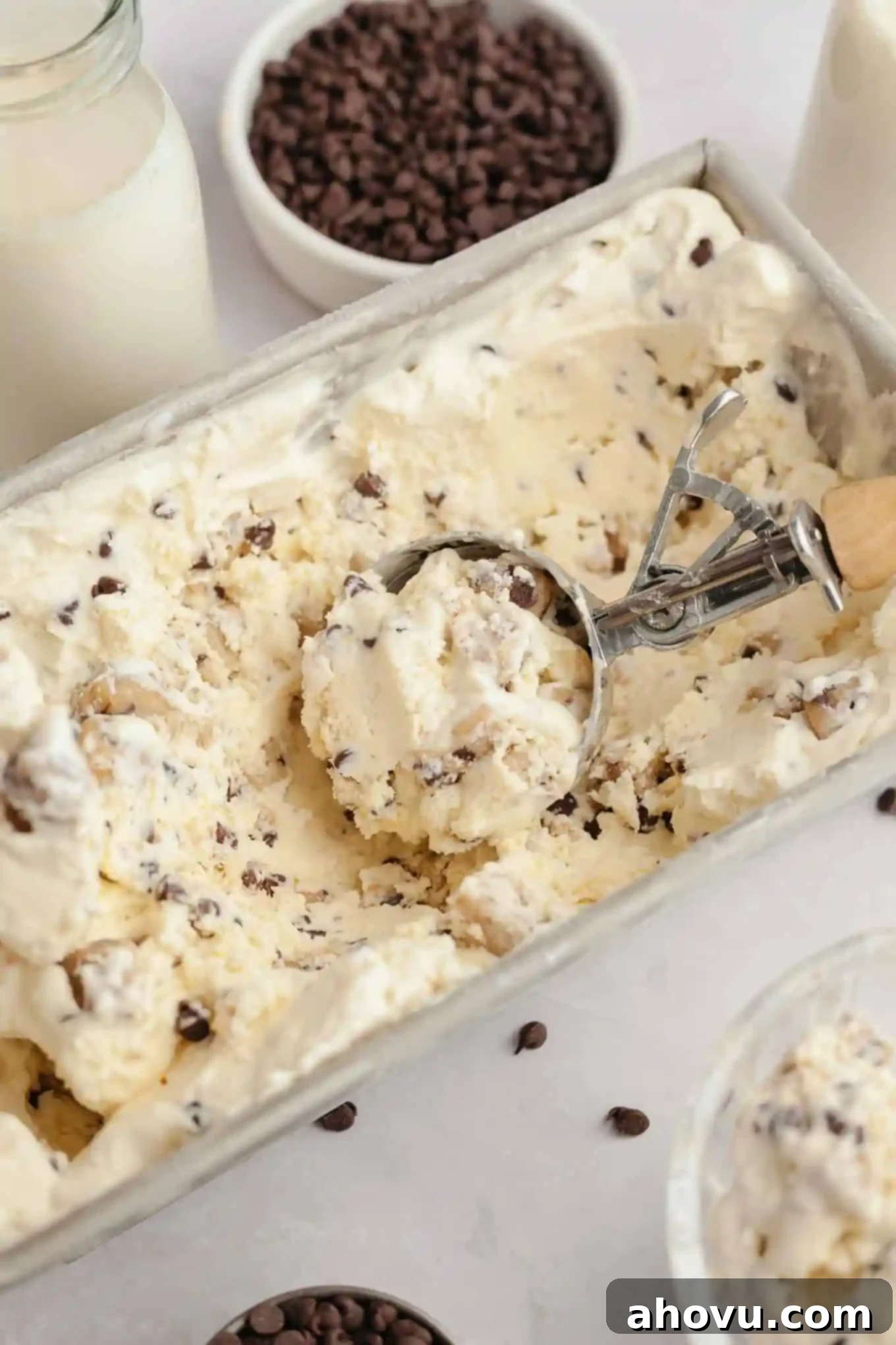 A loaf pan filled with cookie dough ice cream.