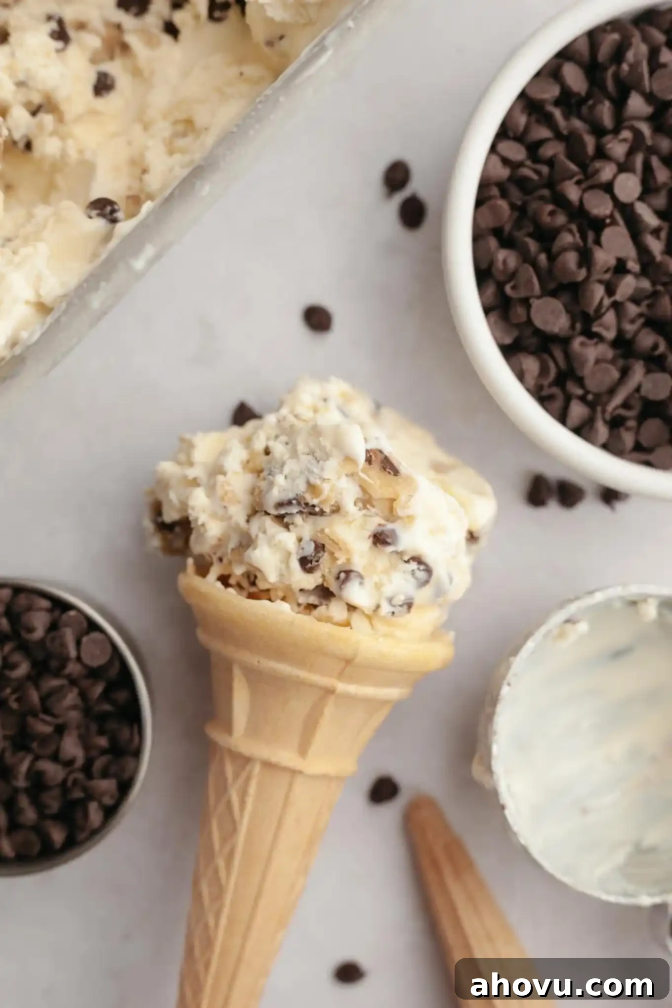 An overhead view of an ice cream cone lying on its side. 