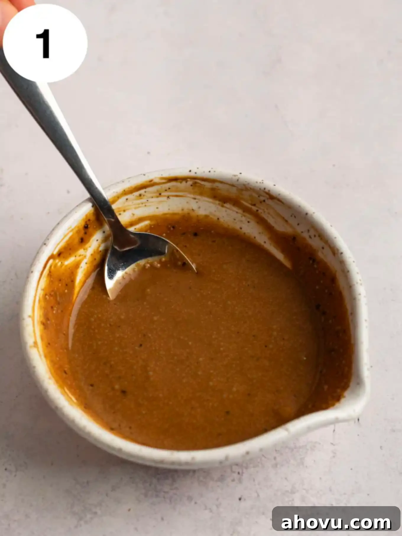 Heavy cream and instant coffee whisked together in a small bowl. 