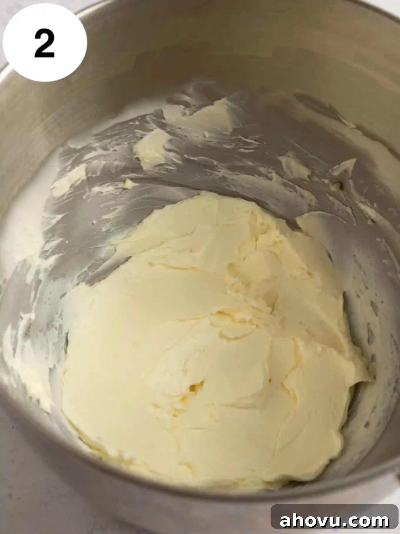 Beaten butter in the bowl of a stand mixer. 