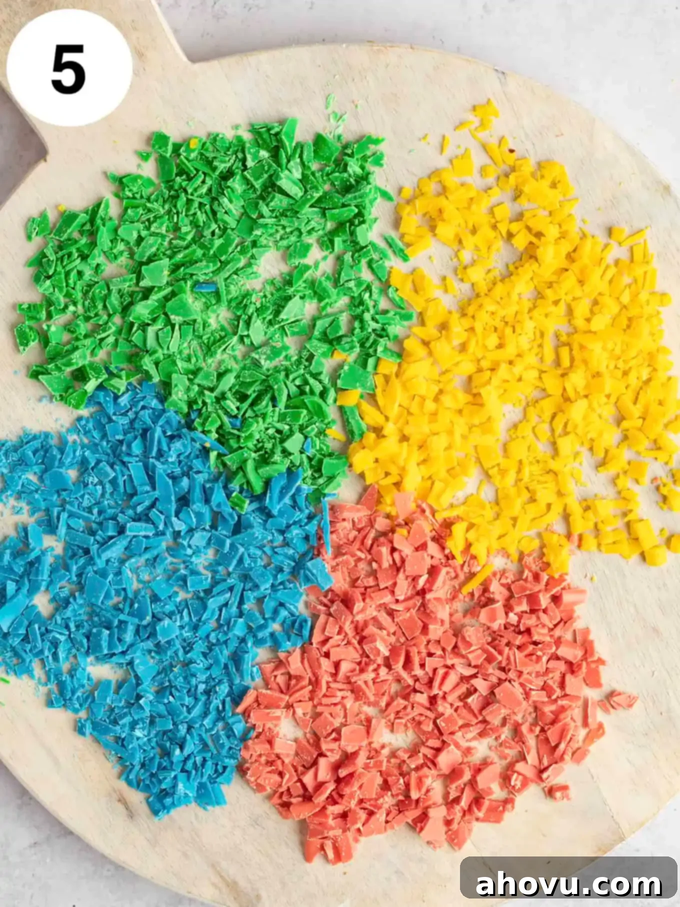 Joyful Confetti Frosting 8 An overhead view of homemade rainbow chips on a cutting board.