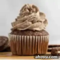 A chocolate cupcake topped with Oreo frosting.