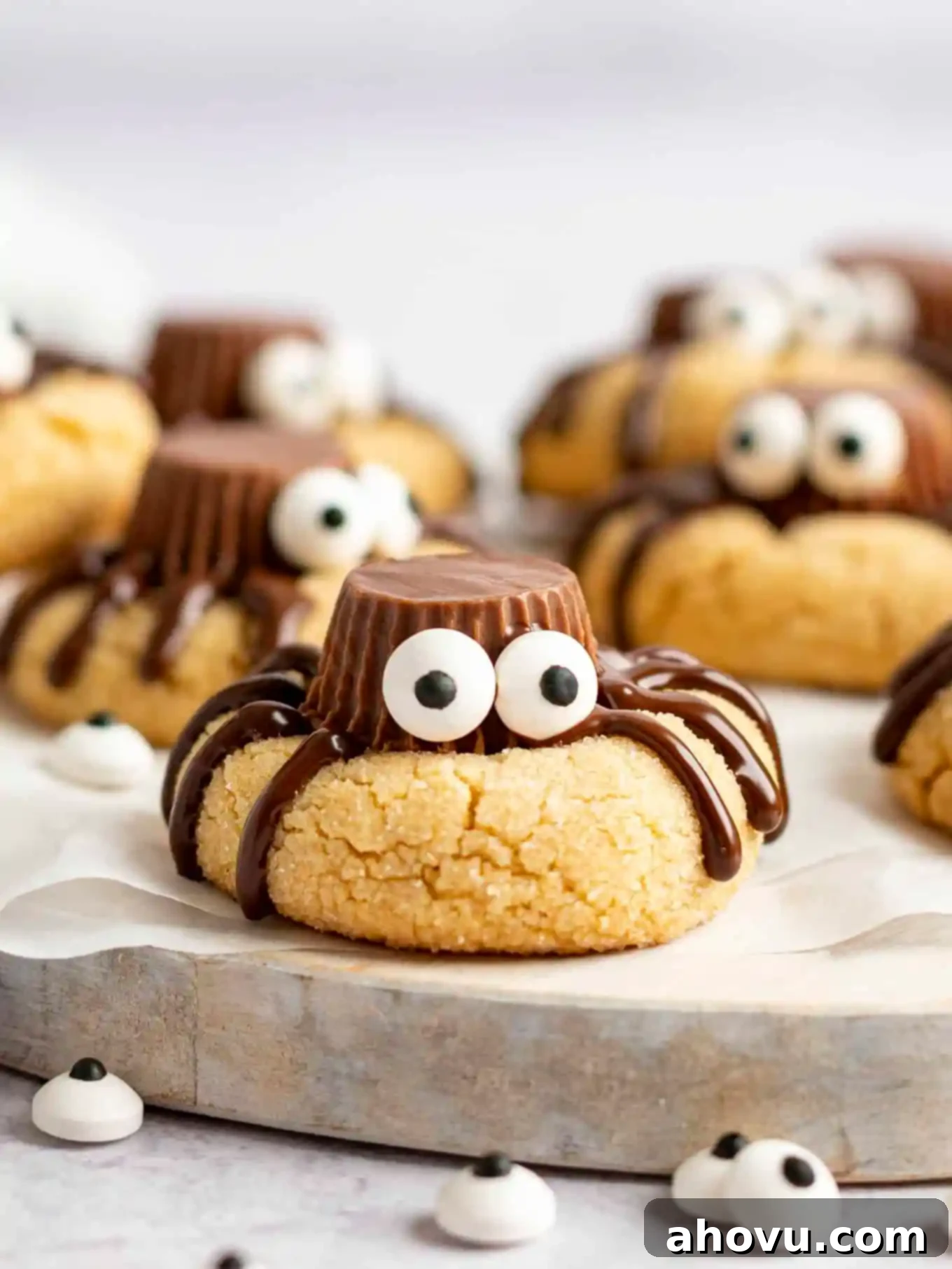 Creepy Crawly Cookie Bites 2 Spider Halloween cookies on a serving board.