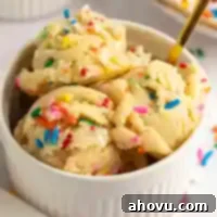 Guilt-Free Sugar Cookie Dough 12 A white ramekin filled with edible sugar cookie dough, ready for enjoyment.