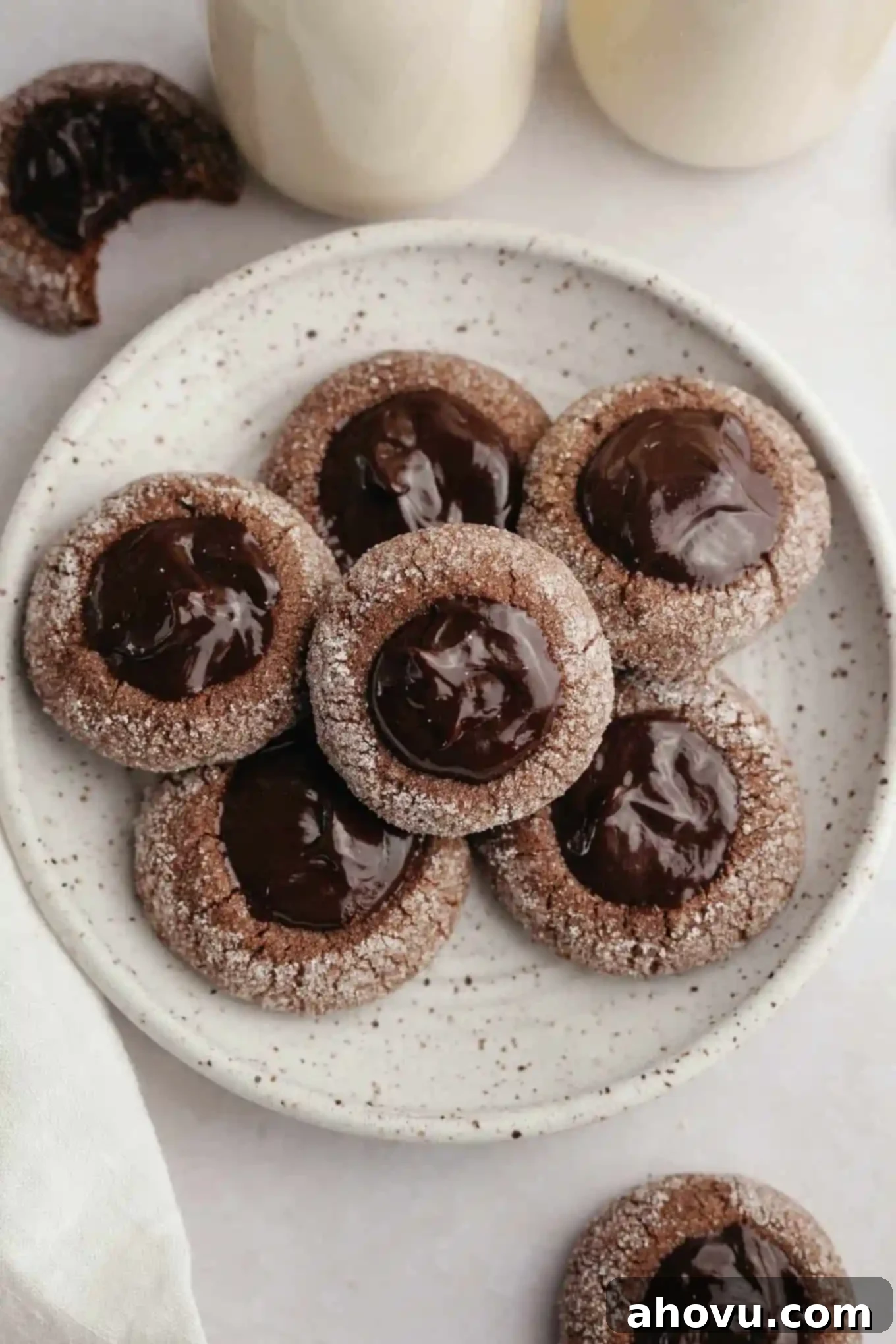 Irresistible Chocolate Thumbprint Cookies 10 An overhead view of a plate of chocolate thumbprint cookies.