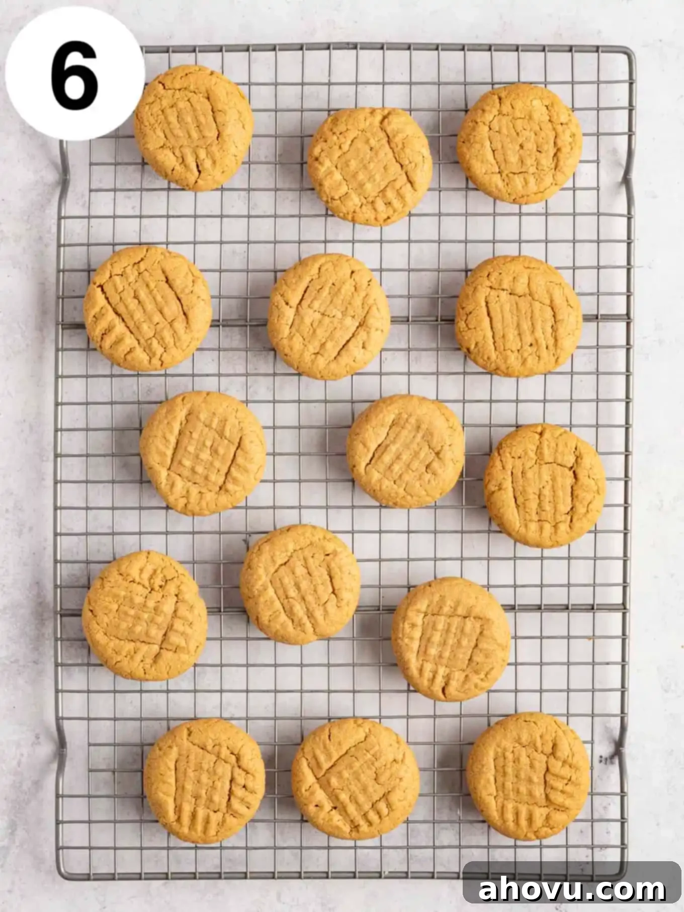 An overhead view of 3 ingredient peanut butter cookies on a wire rack. 