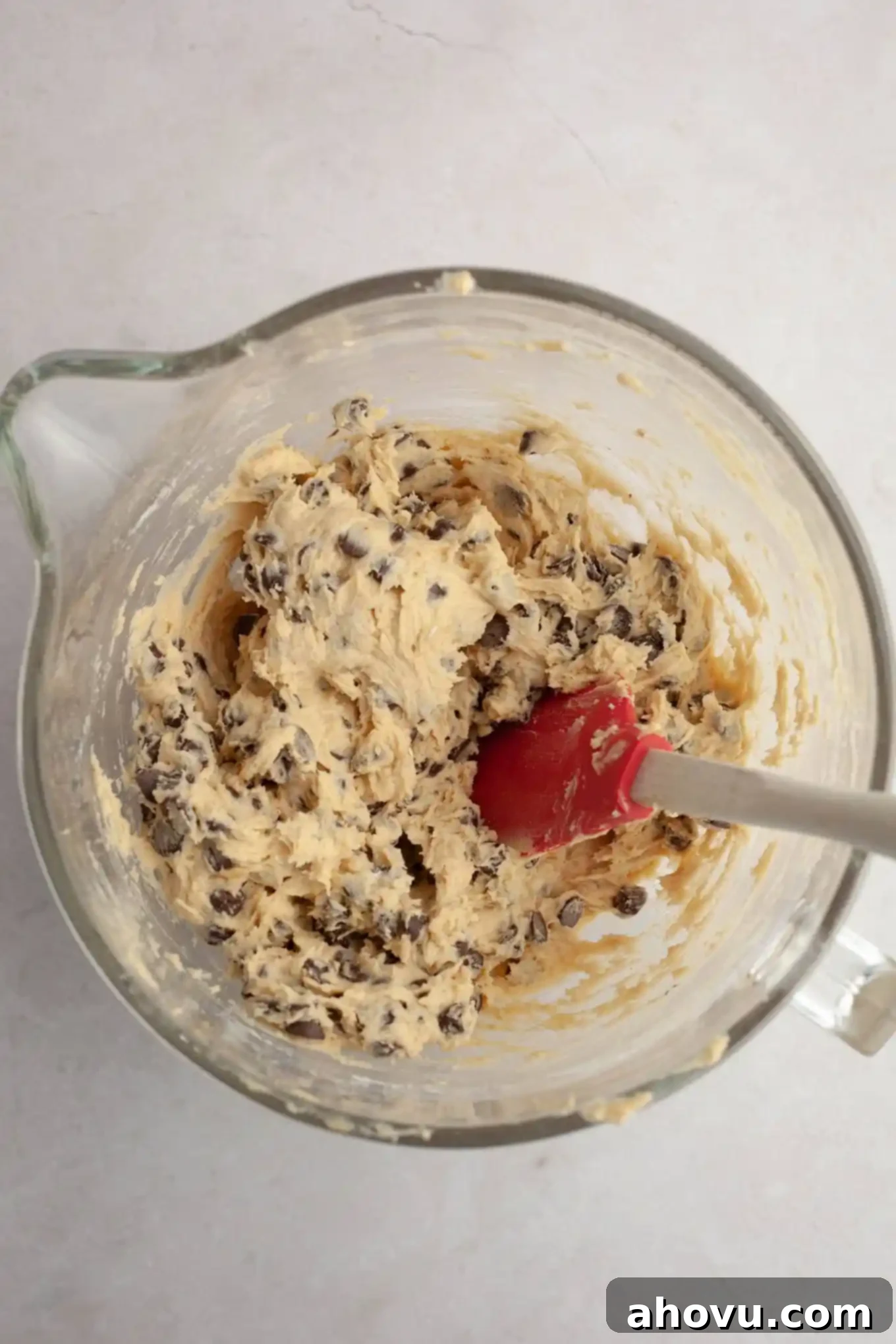 Irresistible Banana Chocolate Chip Cookies 6 Cookie dough in a glass mixing bowl, mixed together and ready for chilling.