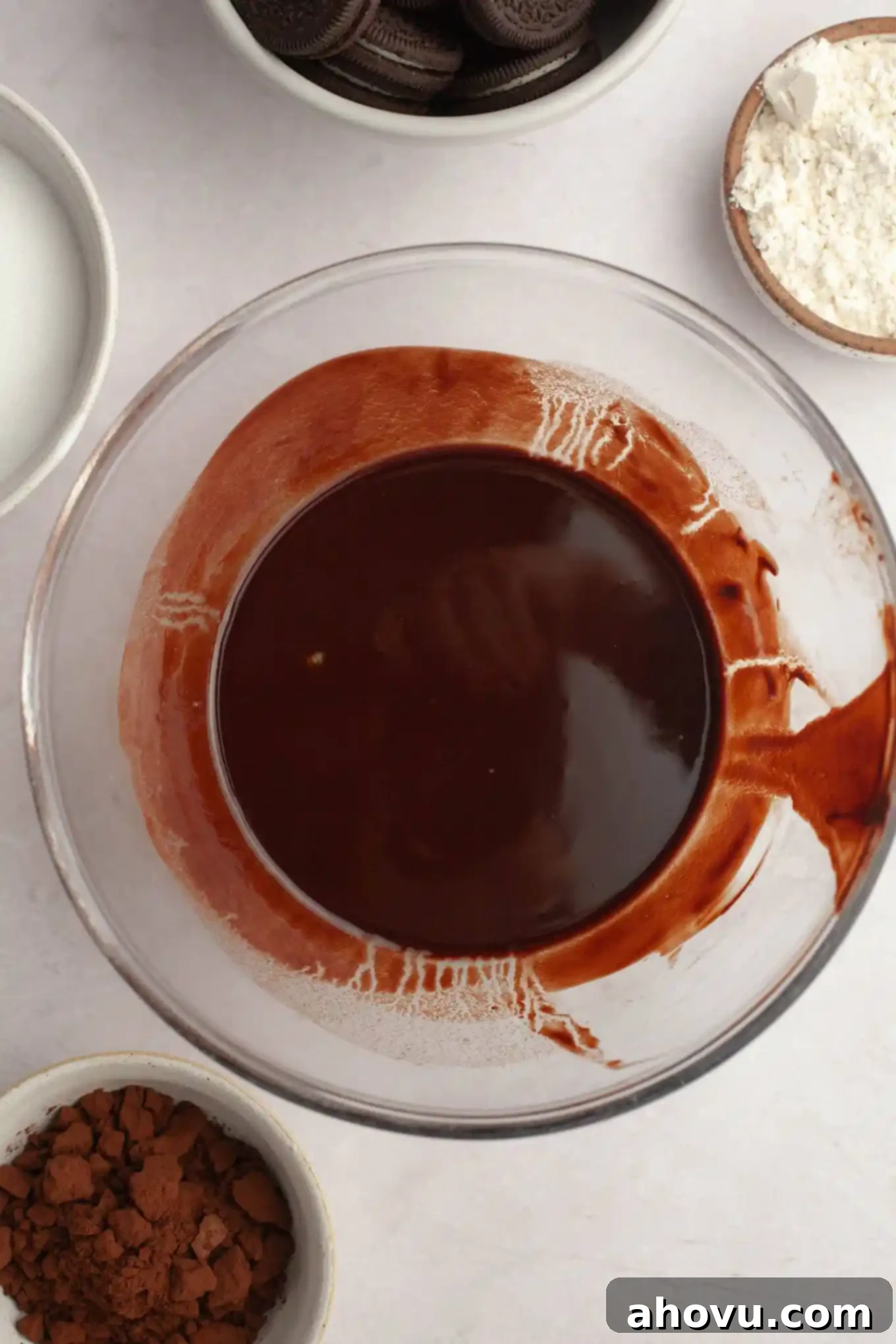 Ultimate Oreo Brownies 4 An overhead view of melted butter and chocolate in a bowl.