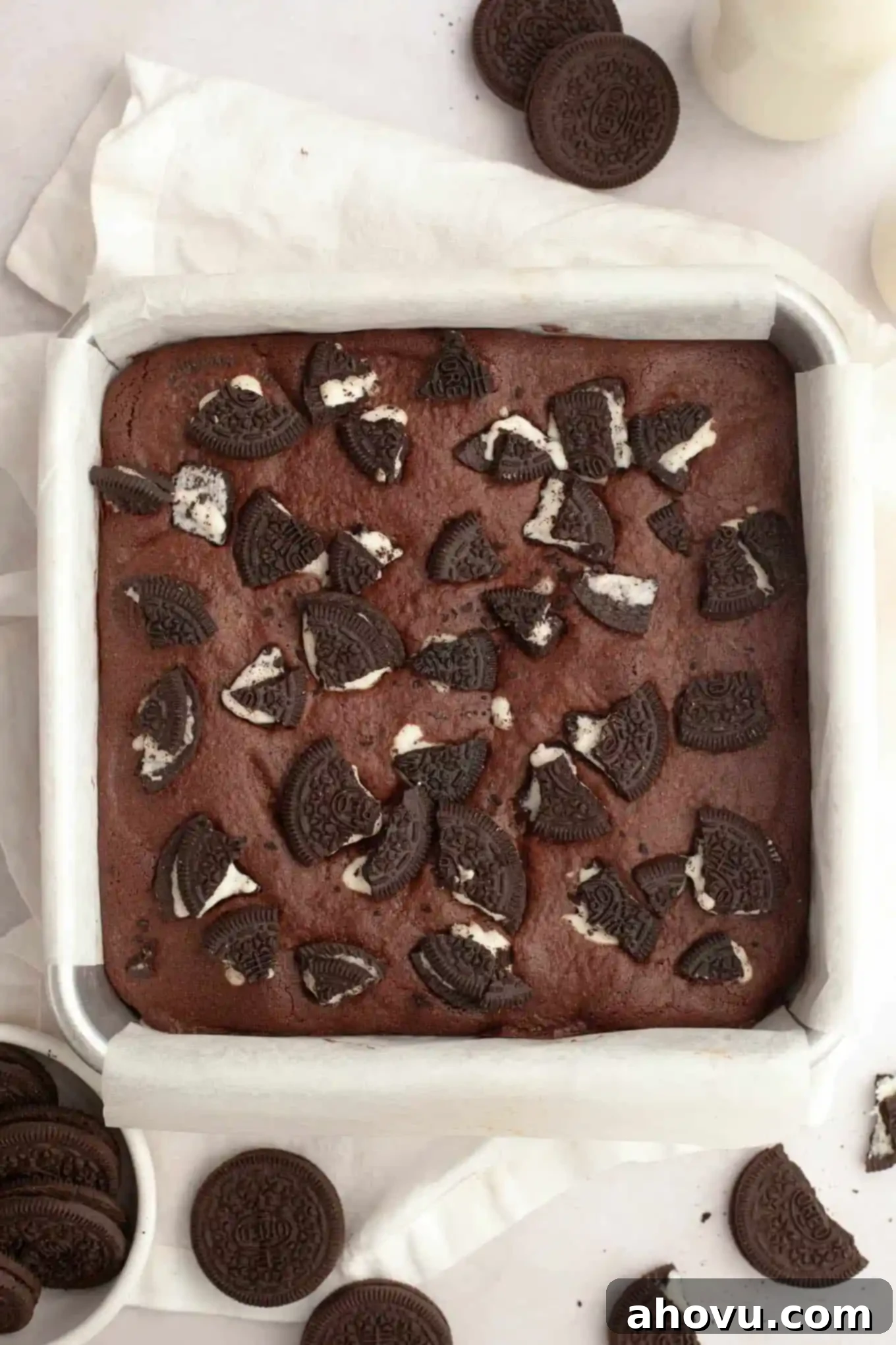 Ultimate Oreo Brownies 7 An overhead view of chocolate brownies topped with Oreos in a pan.