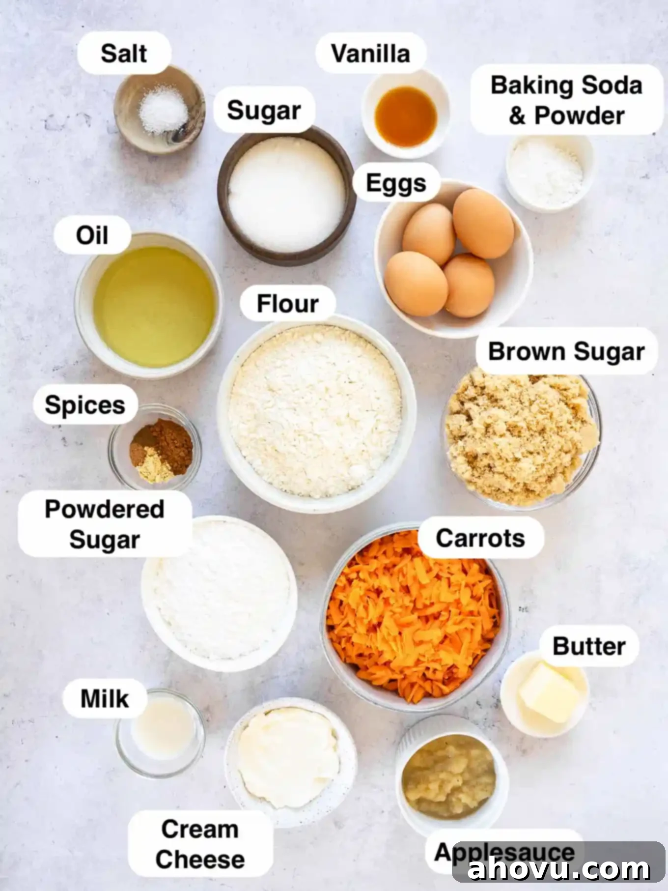 An overhead view of the ingredients needed to make carrot cake in a bundt pan. 