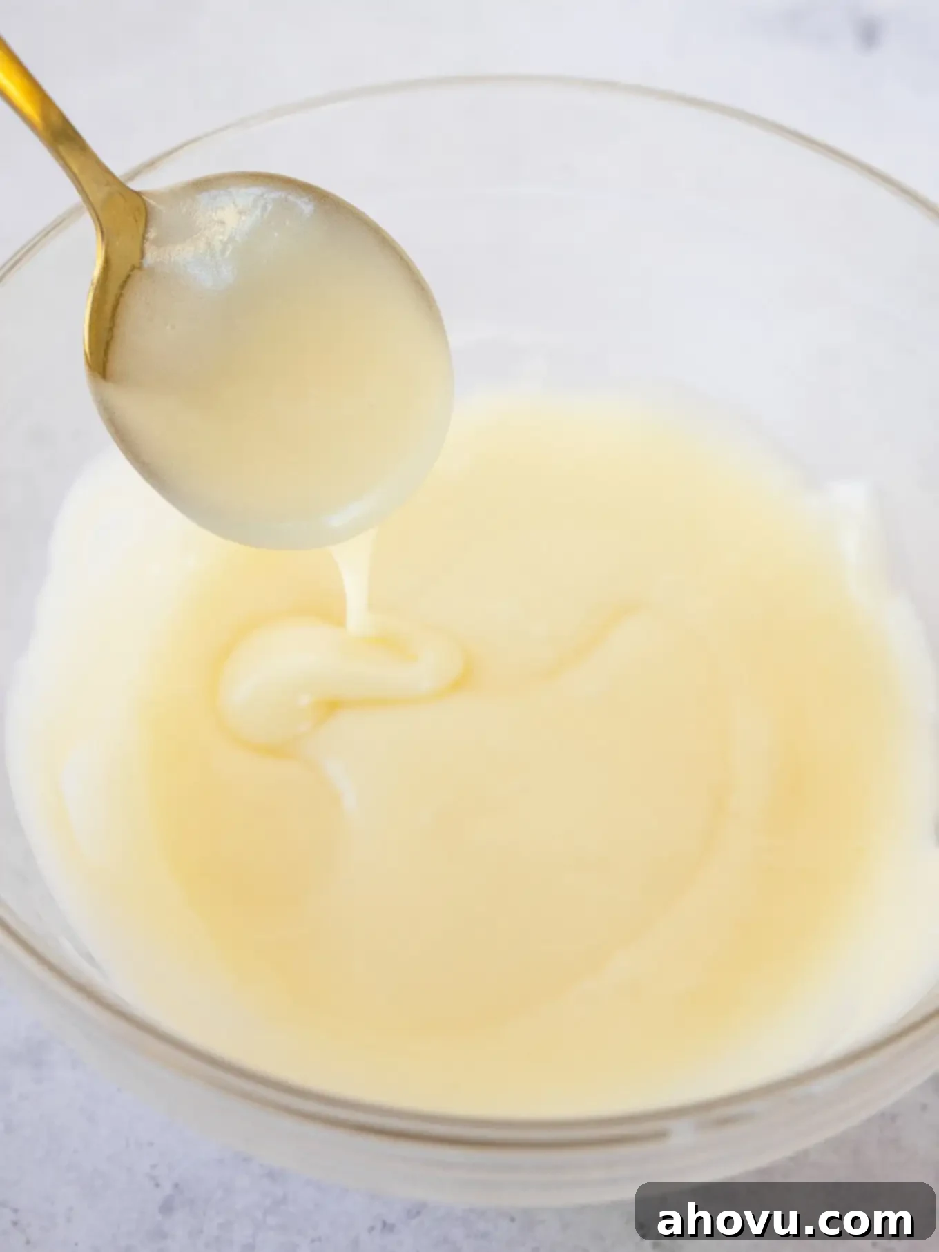 Cream cheese icing in a bowl. 