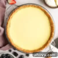 An overhead view of a cheesecake pie.