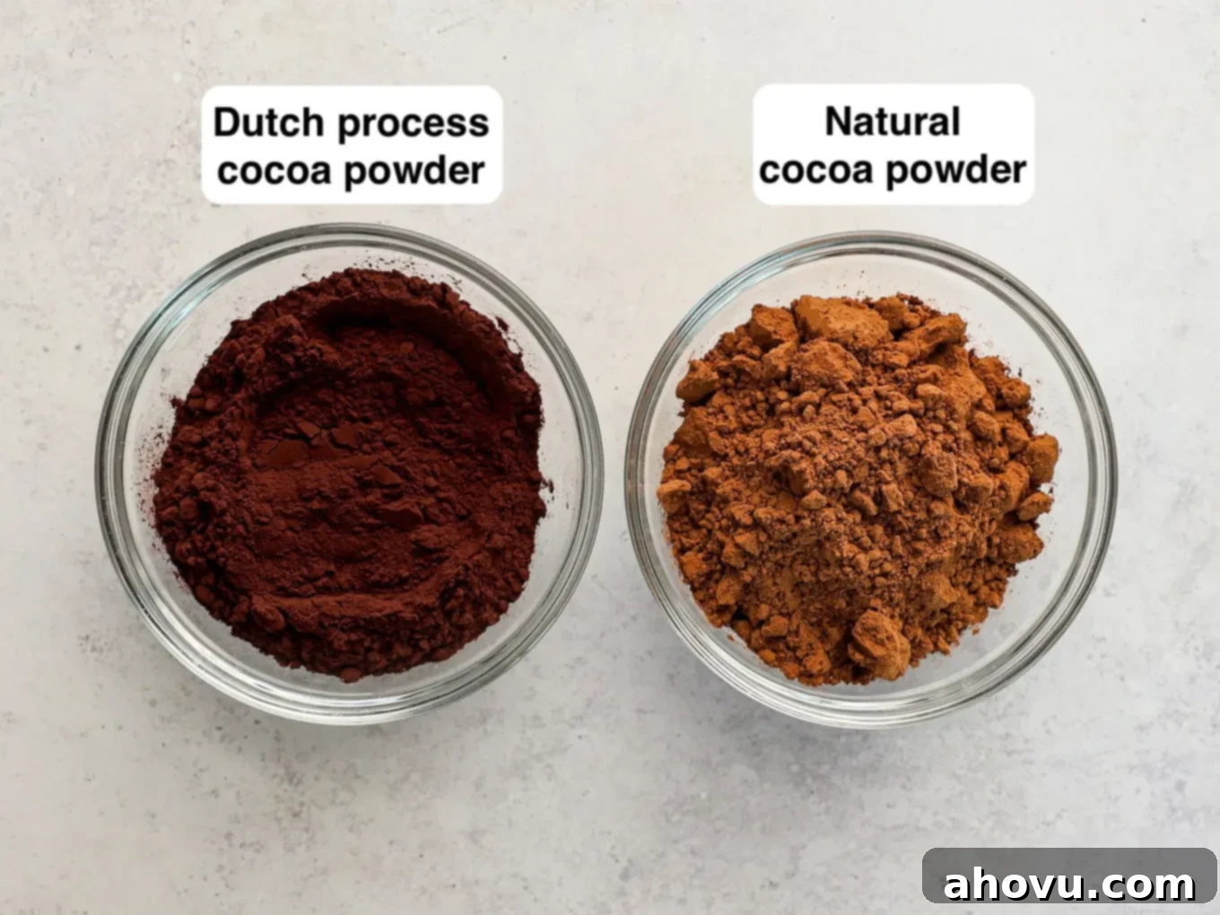Two bowls of cocoa powder, side by side. 