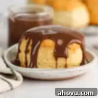 A biscuit topped with chocolate gravy.