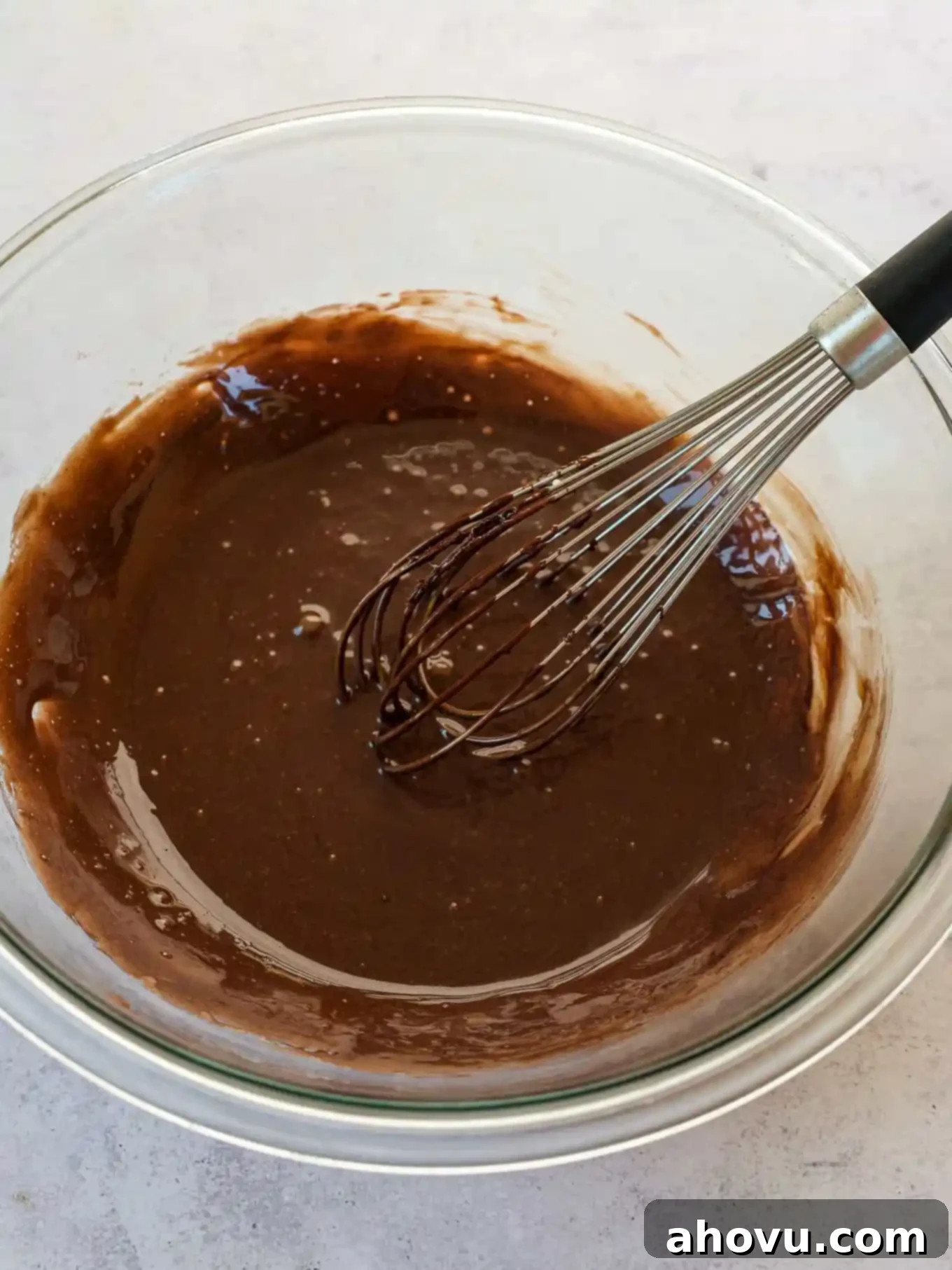 Decadent Chocolate Delight 6 A bowl of melted chocolate mixed with condensed milk, ready for the next step of making no-churn ice cream.