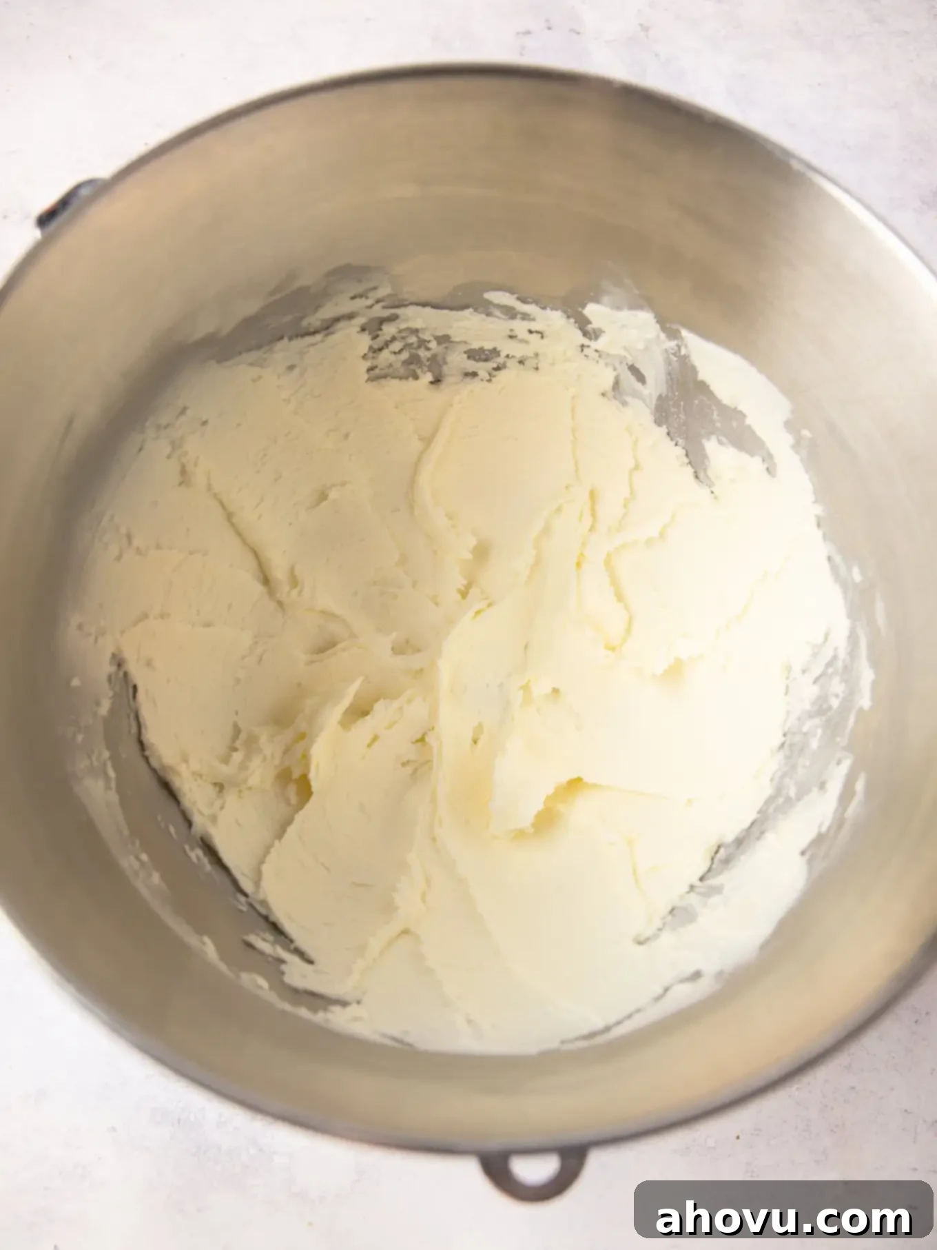 Dreamy Strawberry Cream Cheese Topping 5 Softened butter and powdered sugar expertly mixed together in a large mixing bowl, creating a smooth base.