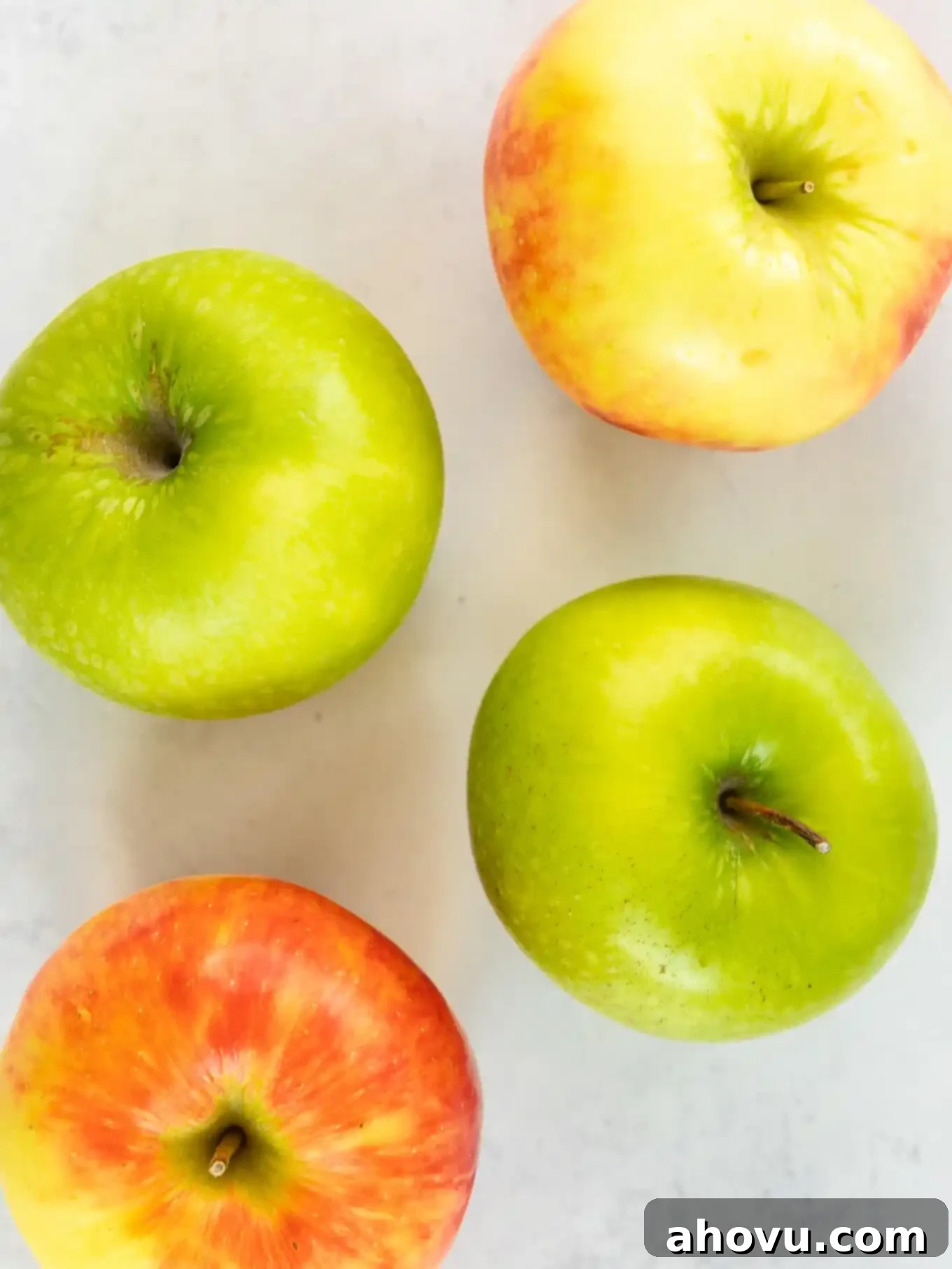 Four apples, seen from above. 