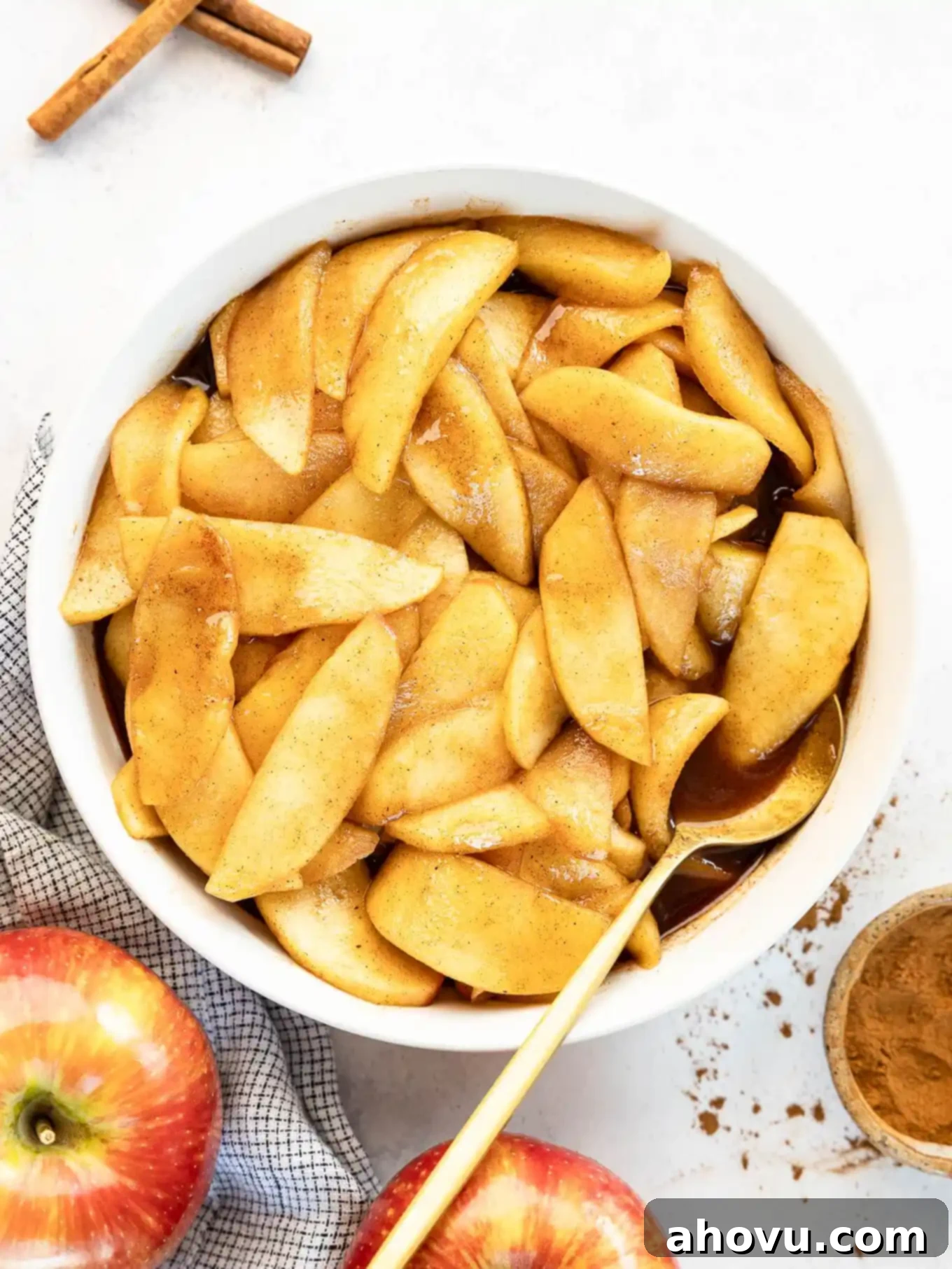 An overhead view of a bowl of fried apples. 