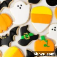 Frightfully Delicious Halloween Treats 12 An overhead view of several iced Halloween sugar cookies.