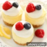A mini lemon cheesecake on a white background.