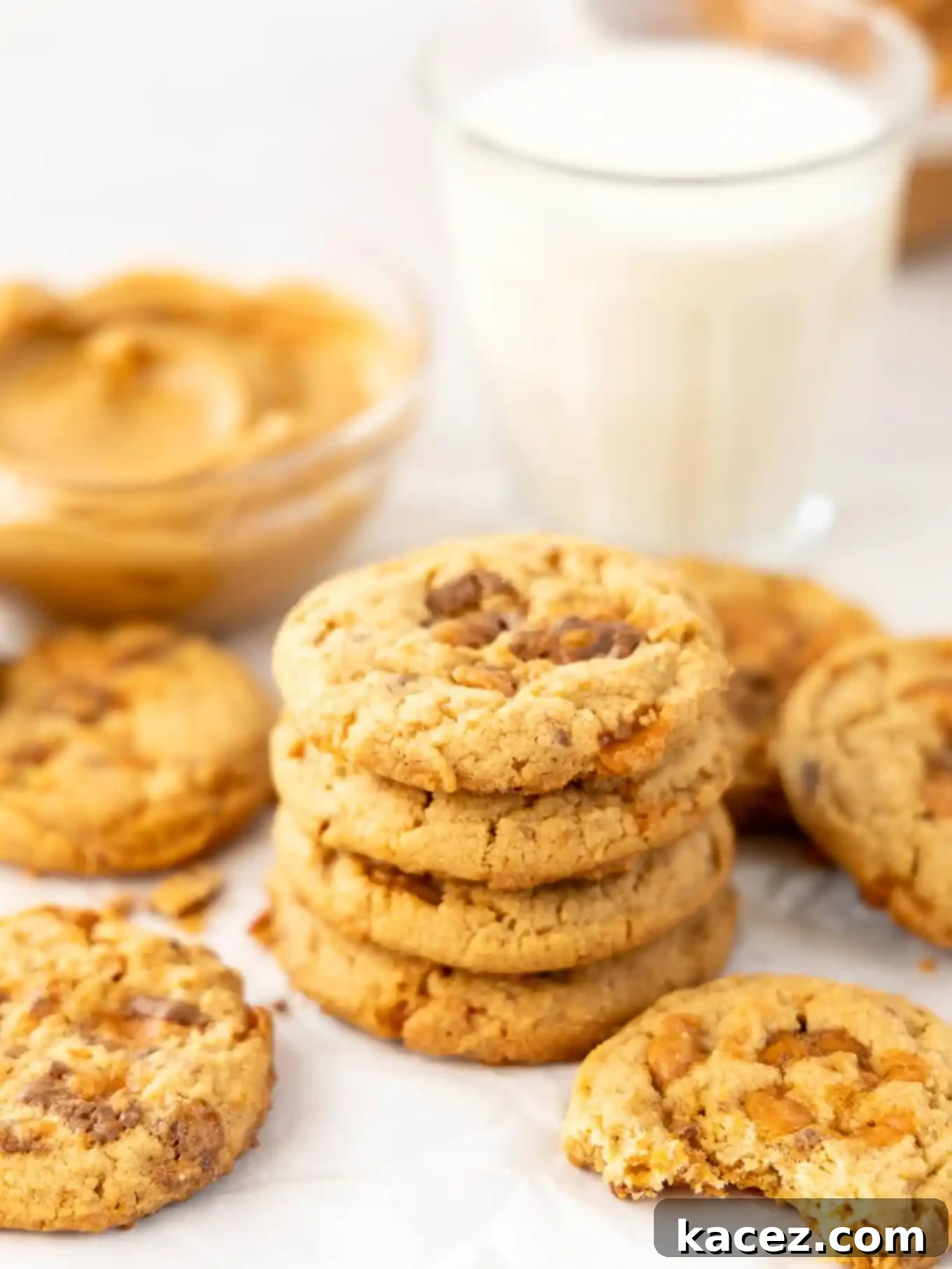 Sweet & Crunchy Butterfinger Treats 7 A beautiful stack of Butterfinger cookies, perfectly golden and chewy, with more cookies artfully arranged around them.