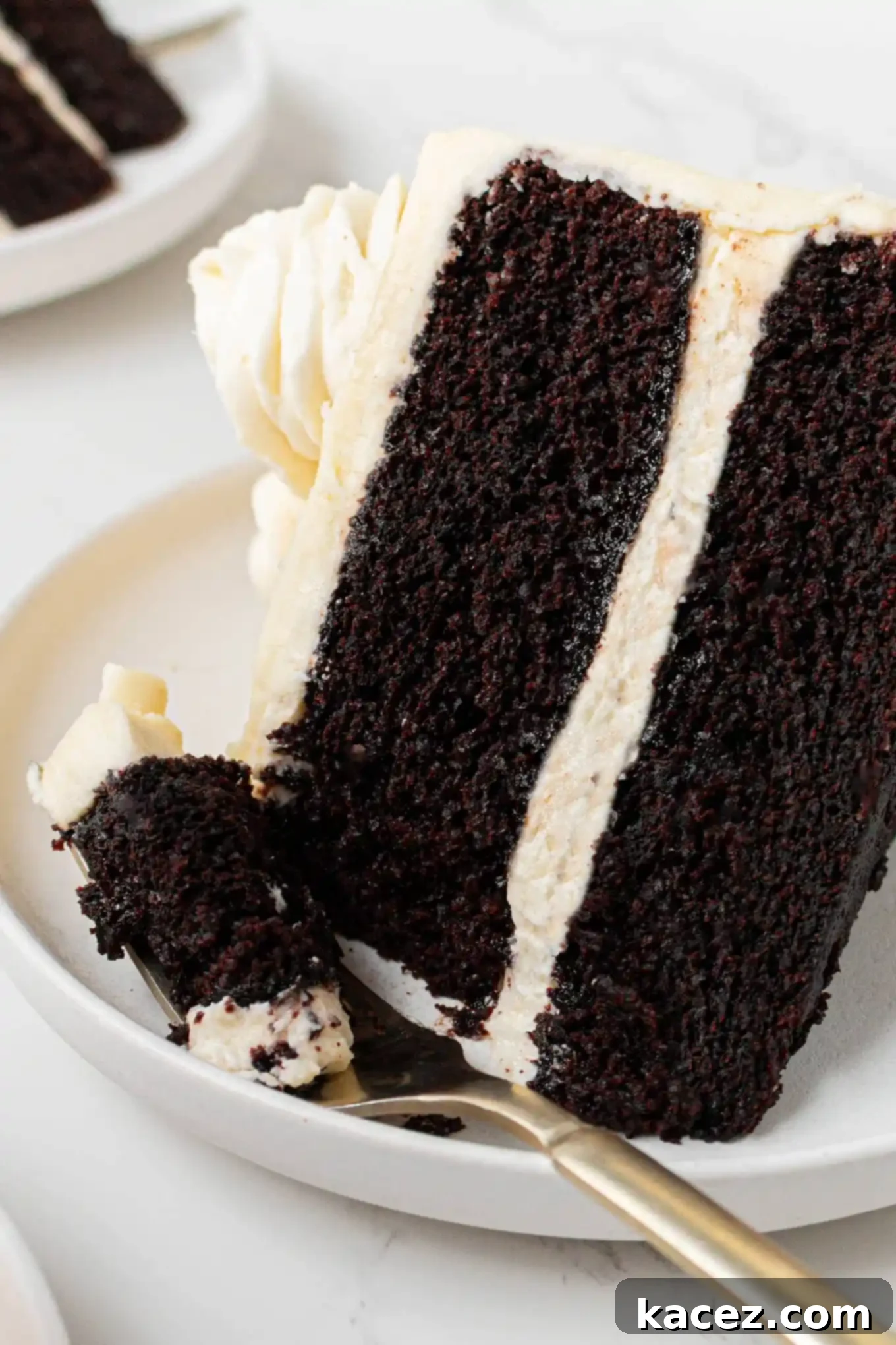 Guinness Chocolate Dream Cake 11 A single slice of Guinness chocolate layer cake served on a plate, ready to enjoy.